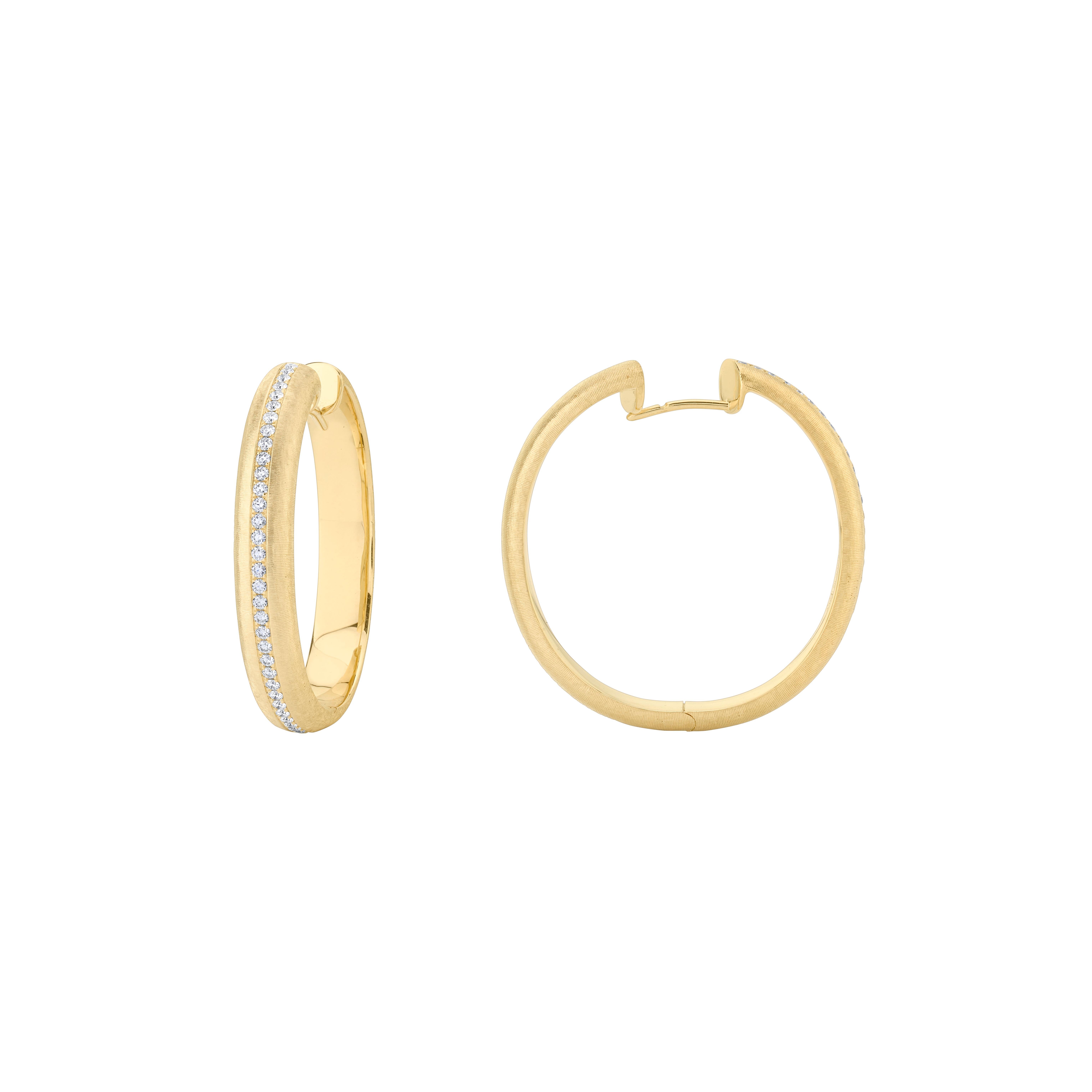 Style #: XH30E.
SYLVIA KONTENTE  18K Yellow gold diamond hoop earrings with hand-engraved finish.
Precision-cut, round brilliant diamonds.
Diamond total weight: 0.62ct tw.
Diamond color/clarity: DEF/VVS VS.
Hand-engraved finish - The ancient art of