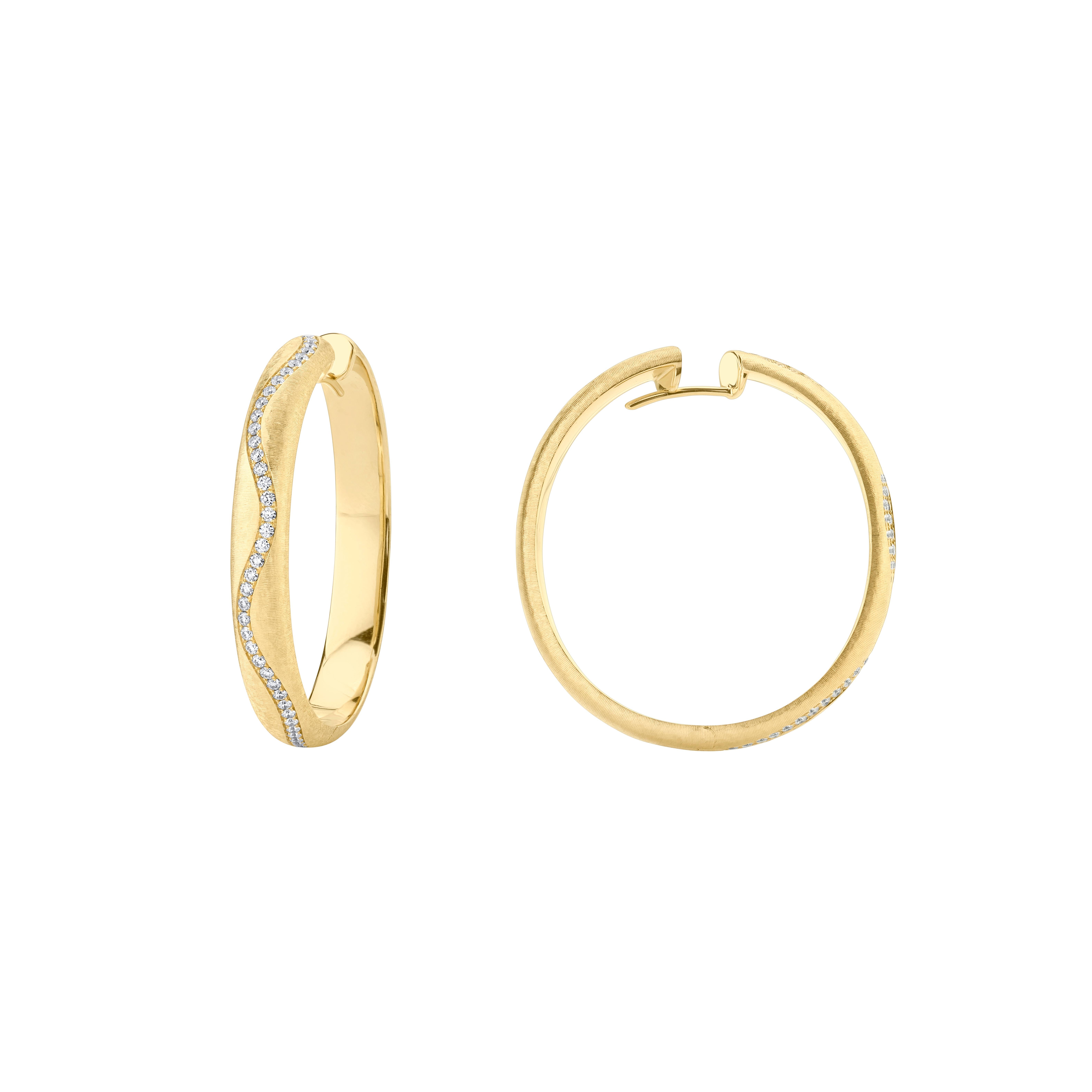 Style #: XHW35E.
SYLVIA KONTENTE  18K Yellow gold diamond hoop earrings with hand-engraved finish.
Precision-cut, round brilliant diamonds.
Diamond total weight: 0.73ct tw.
Diamond color/clarity: DEF/VVS VS.
Hand-engraved finish - The ancient art of