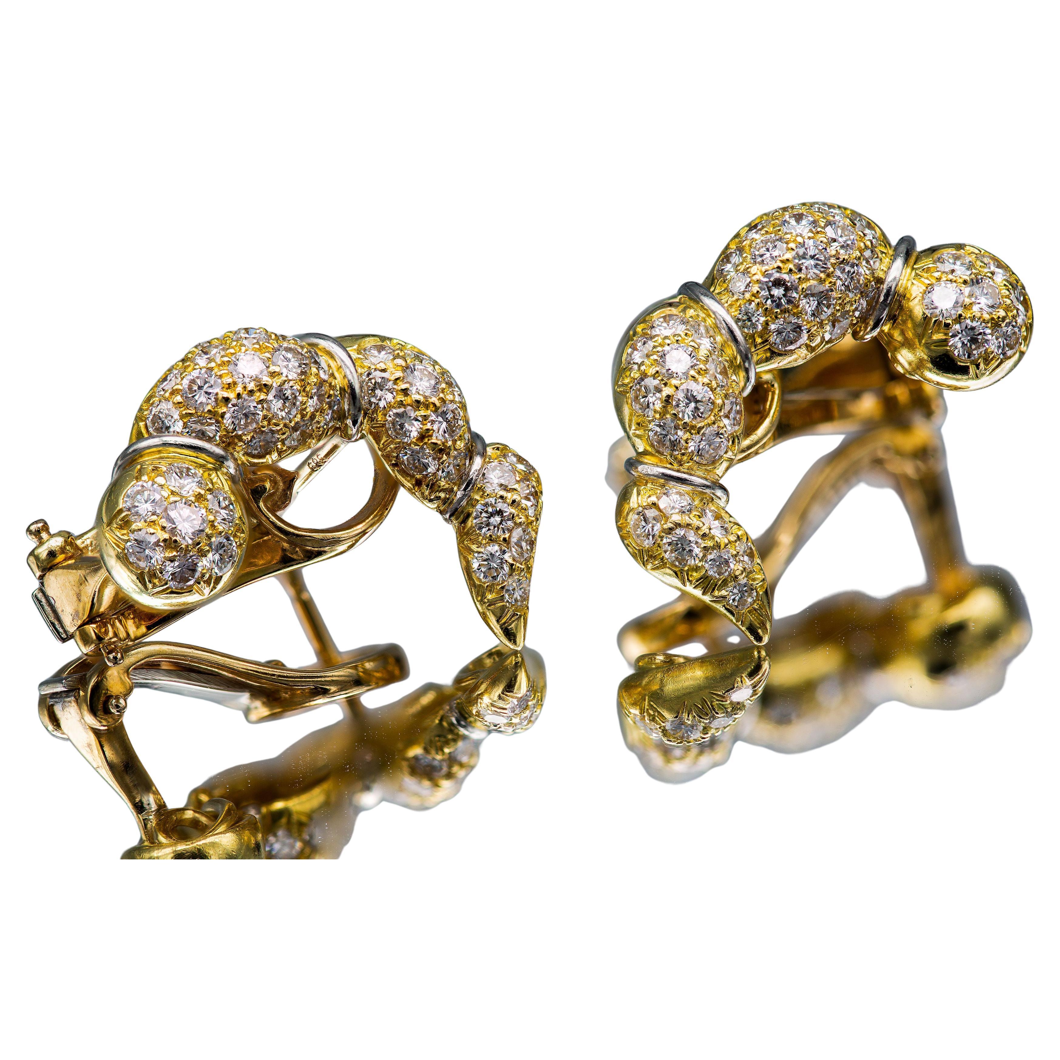 Material: 18k Yellow Gold
Gemstone: Diamond 2.50 cttw
Weight: 12.5 grams
Closure: Omega Back

Classic, stunning diamond earrings. Secure fit with omega back. Stamped Italy and 18k.