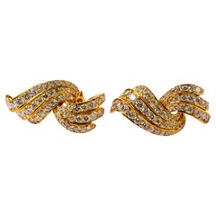 Pendientes de diamantes de oro amarillo de 18k con reverso Omega