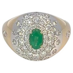 Bague en or jaune 18K avec diamant et émeraude