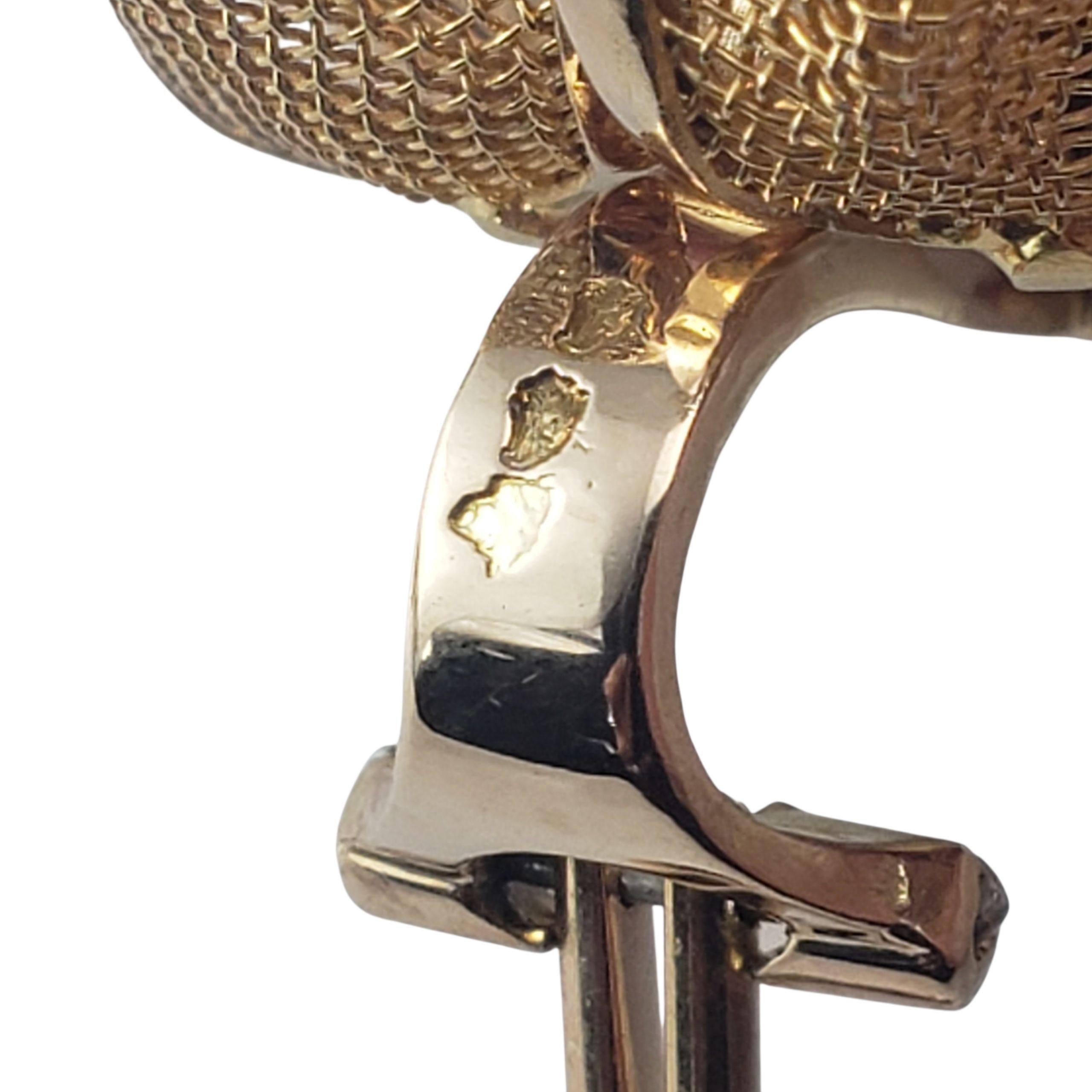 Orecchini a fiore con diamante 