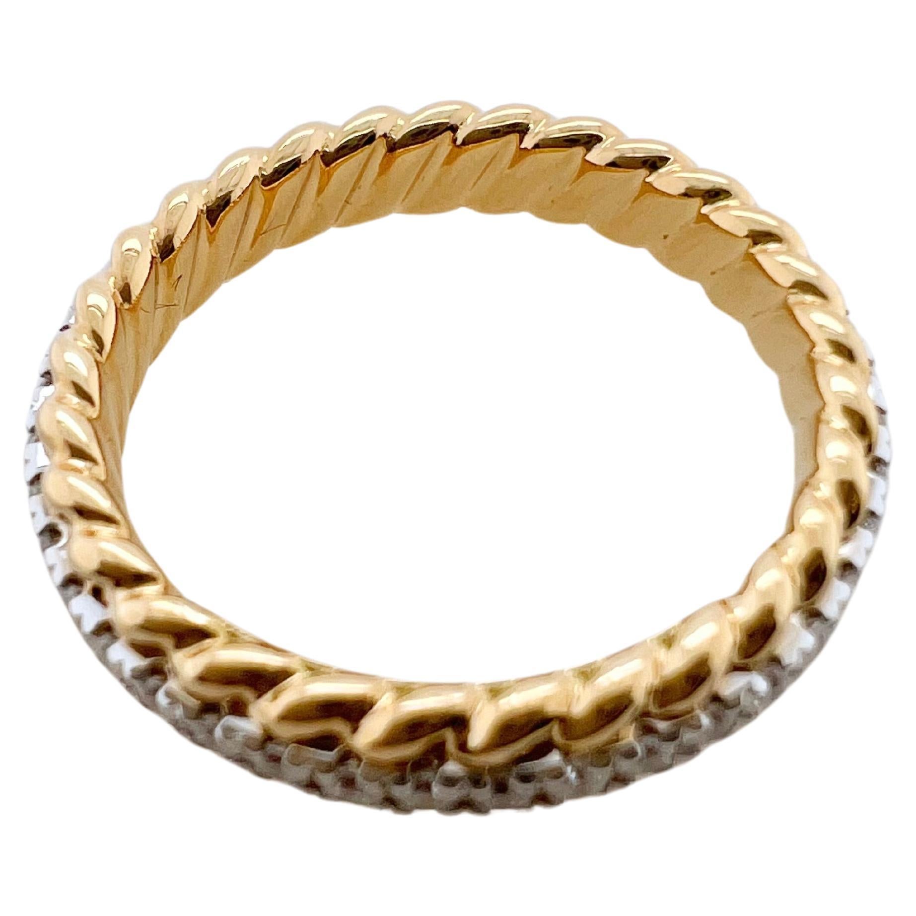 This amazing band will be your go to favorites.  This individual band is made in 18k yellow gold with round brilliant diamonds prong set.  The outer edges have a unique rope style trim that give texture and character.  The solid gold is made sturdy