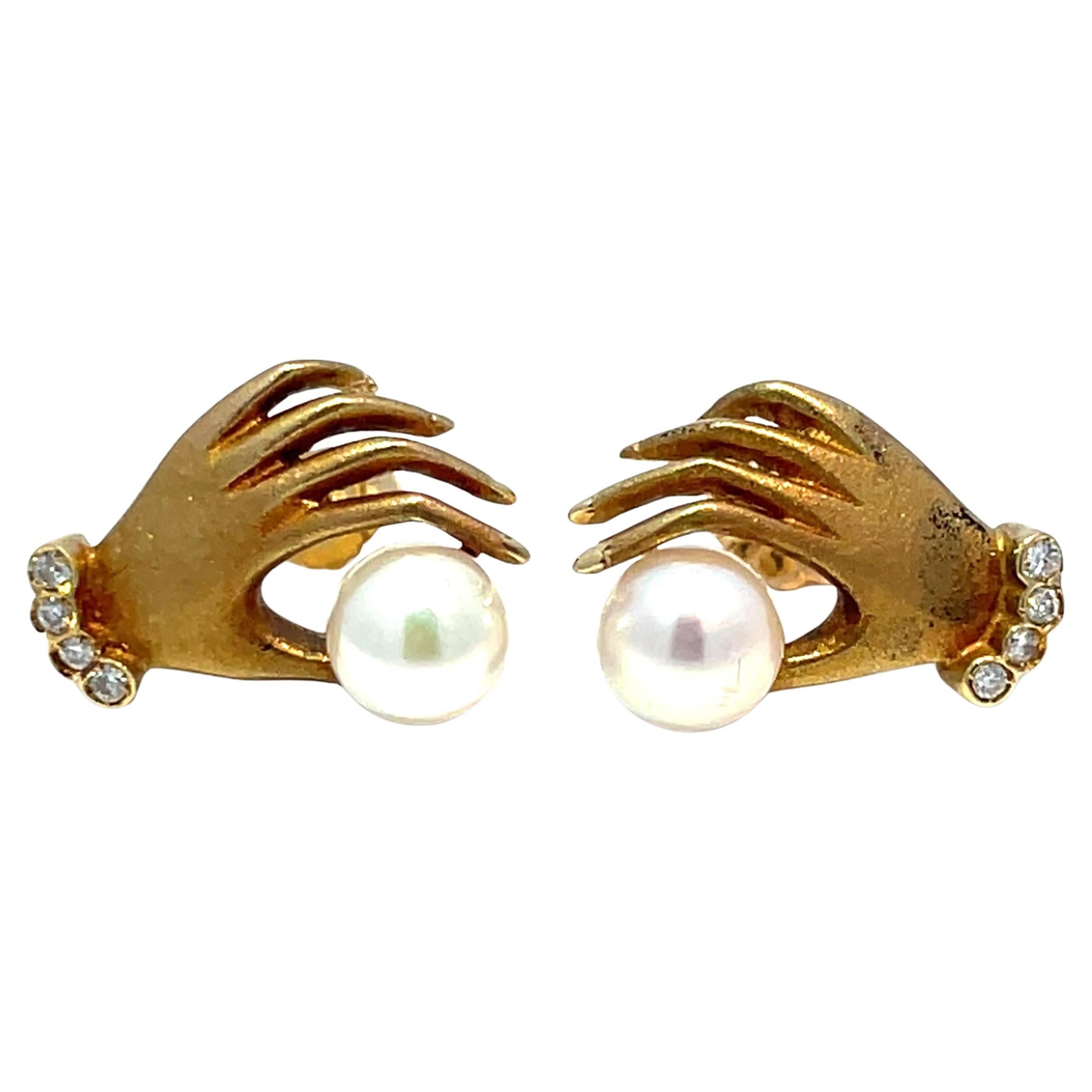 18k Yellow Gold Diamond Hand Holding Pearl Earrings For Sale
