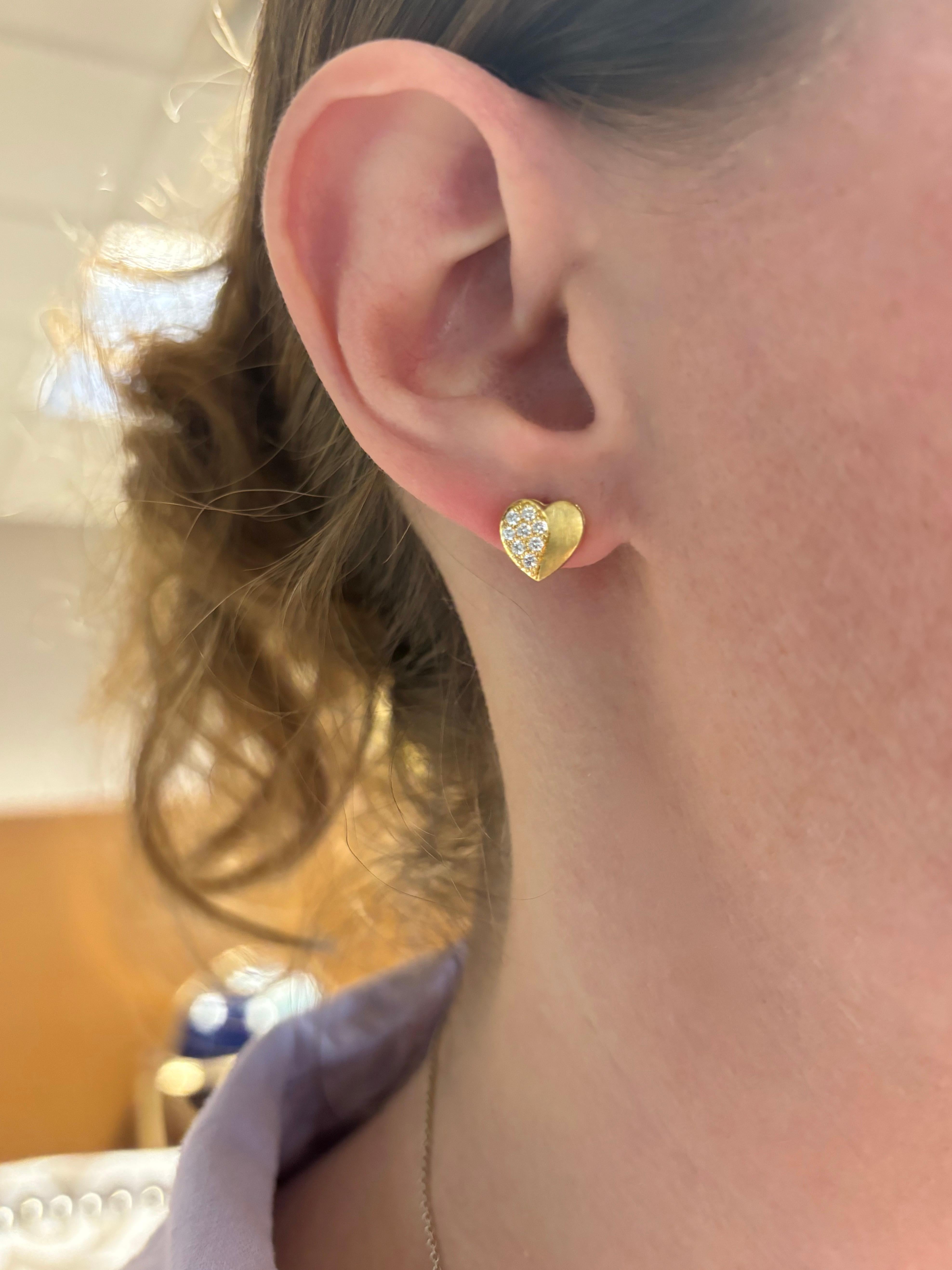 Matte finish diamond heart earrings made in 18k yellow gold. 

Diamond Carat Weight: .33CTW
Diamond Cut: Round Brilliant Cut 
Color: E-F
Clarity: VS
Metal: 18K Yellow Gold
Marked/Tested: Stamped “18K