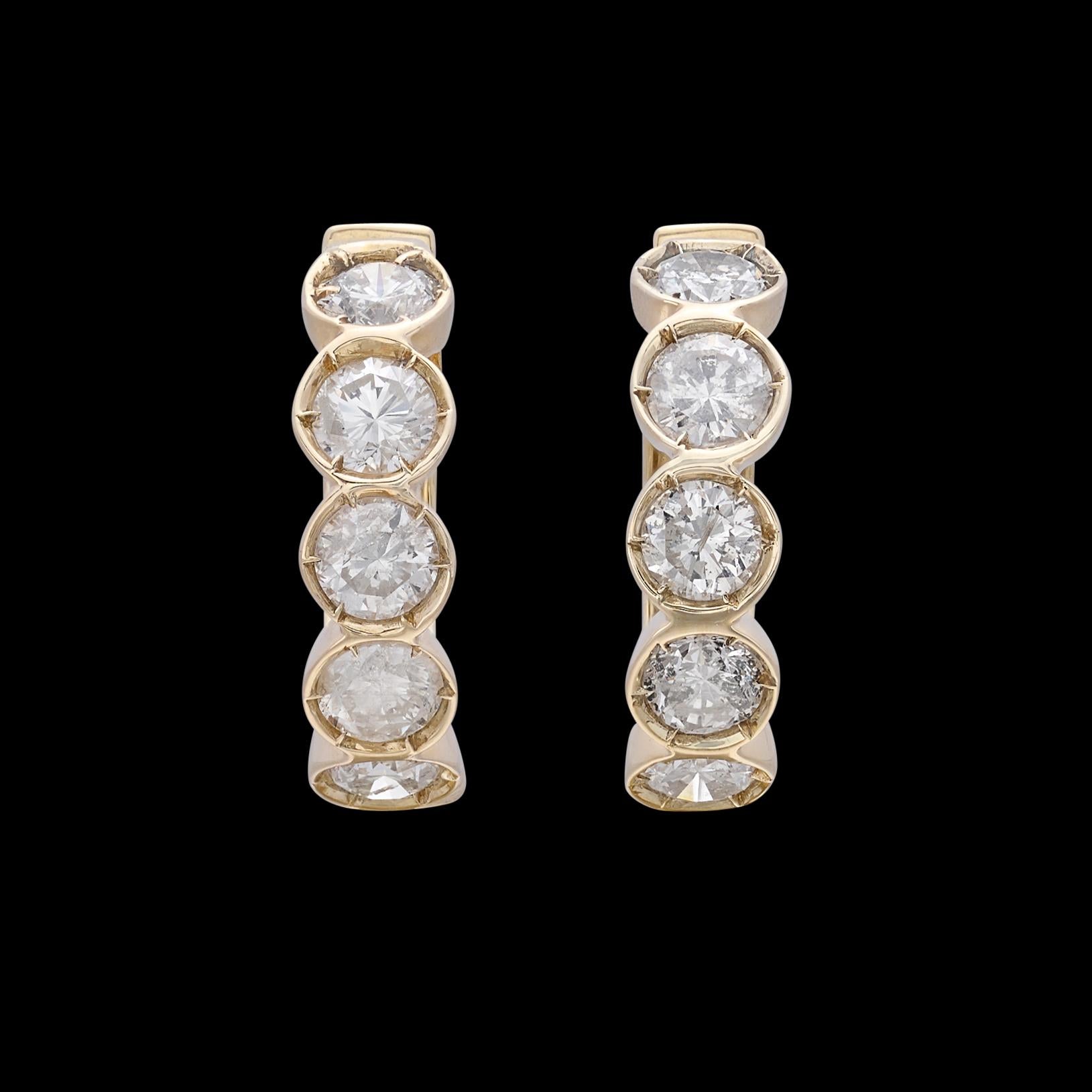 Add sparkle to your ears! This pair of 18k yellow gold hoop earrings are diamond-forward, designed with 12 bezel-set round brilliant-cut diamonds, weighing an estimated 2.40 carats (averaging H-I/SI). The earrings weigh 5.5 grams, and are 5 /8-in.