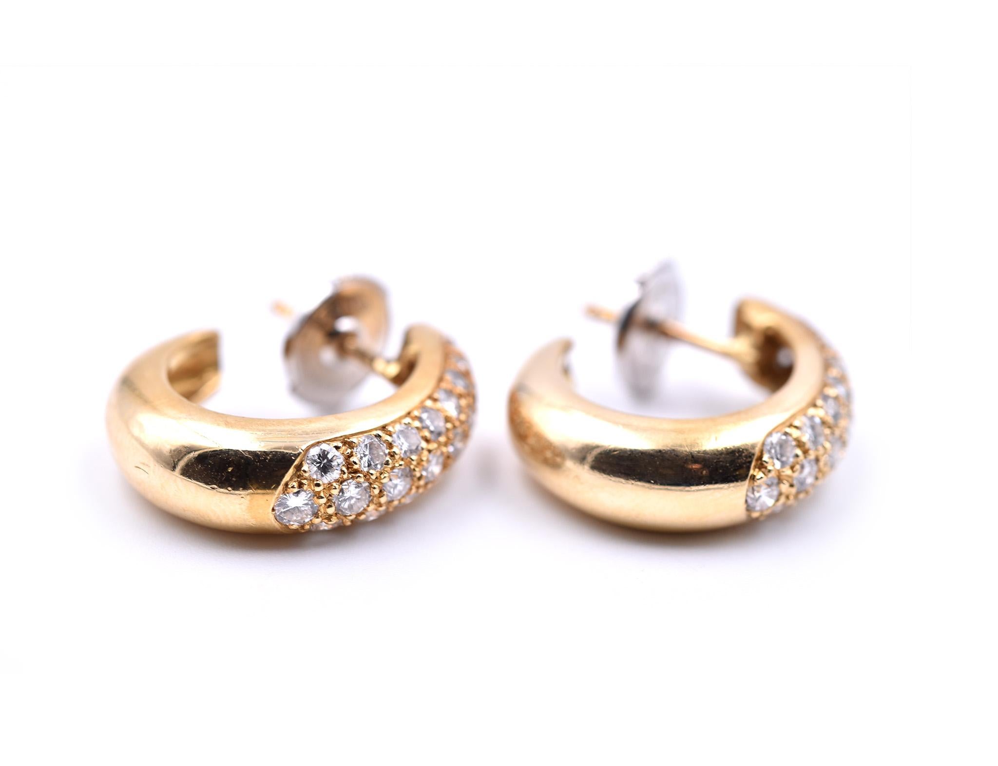 Designer: custom design
Material: 18k yellow gold
Diamonds: 50 round brilliant = 1.10cttw
Color: G
Clarity: VS
Dimensions: earrings are approximately 19.73mm by 5.72mm
Fastenings: post with LaPousette
Weight: 8.01 grams
