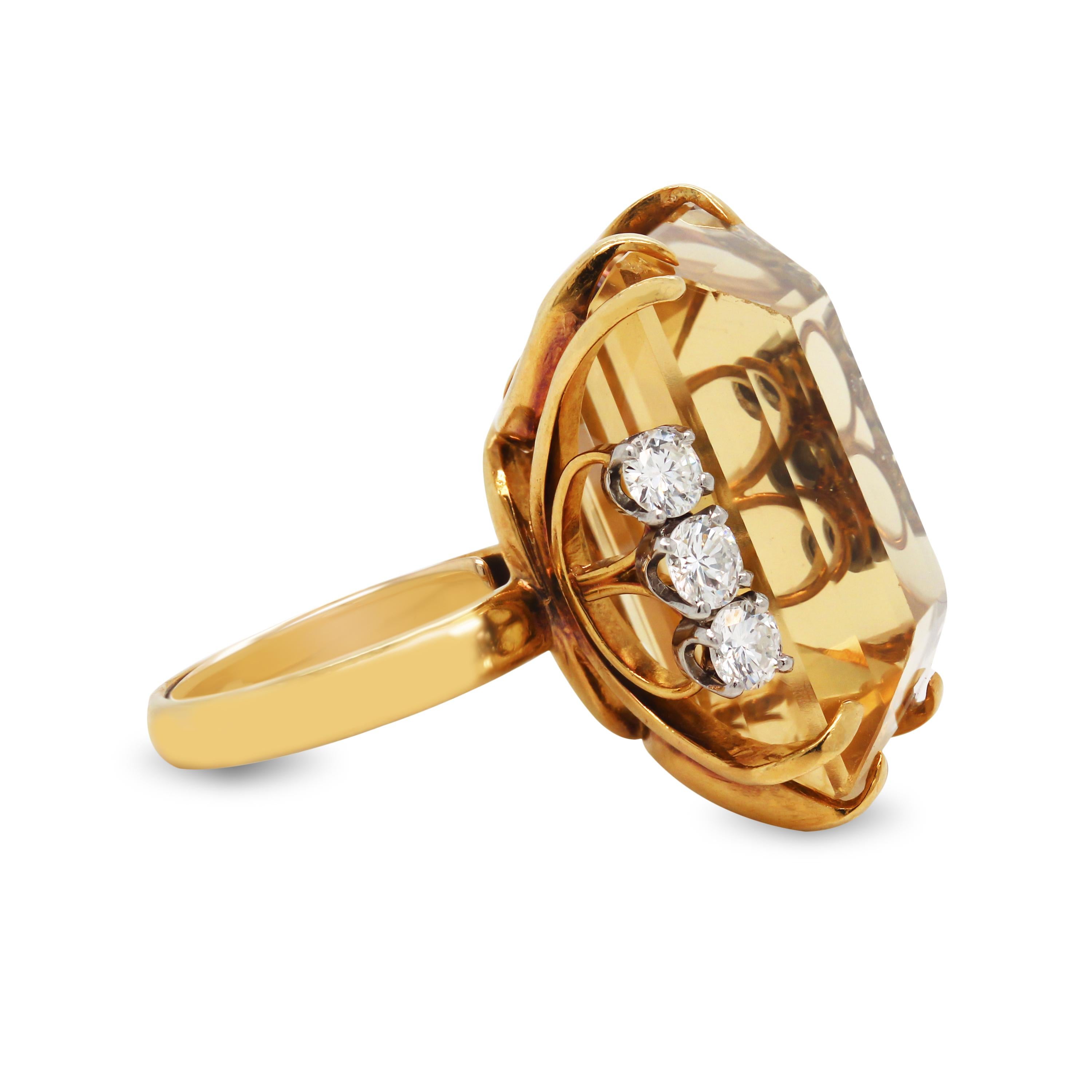 18K Yellow Gold Diamond Large Emerald Cut Citrine Cocktail Ring

A fine and exquisite Citrine sits in the center of this ring with three diamonds on both sides. The Citrine is an emerald cut, and vastly large in size. 

Apprx. 50 carat Citrine