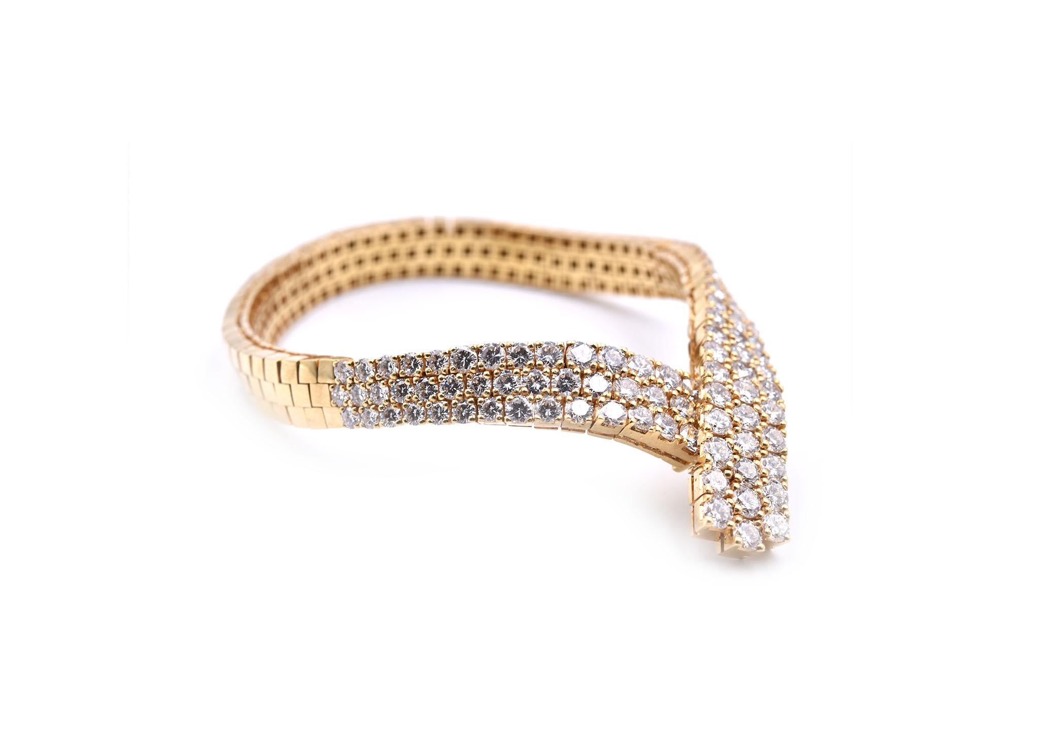 Designer: custom design
Material: 18k yellow gold
Diamonds: 98 round brilliant cut = 10.05cttw
Color: G
Clarity: VS
Dimensions: bracelet is 8-inch long and it is 10.40mm wide
Weight: 51.33 grams
