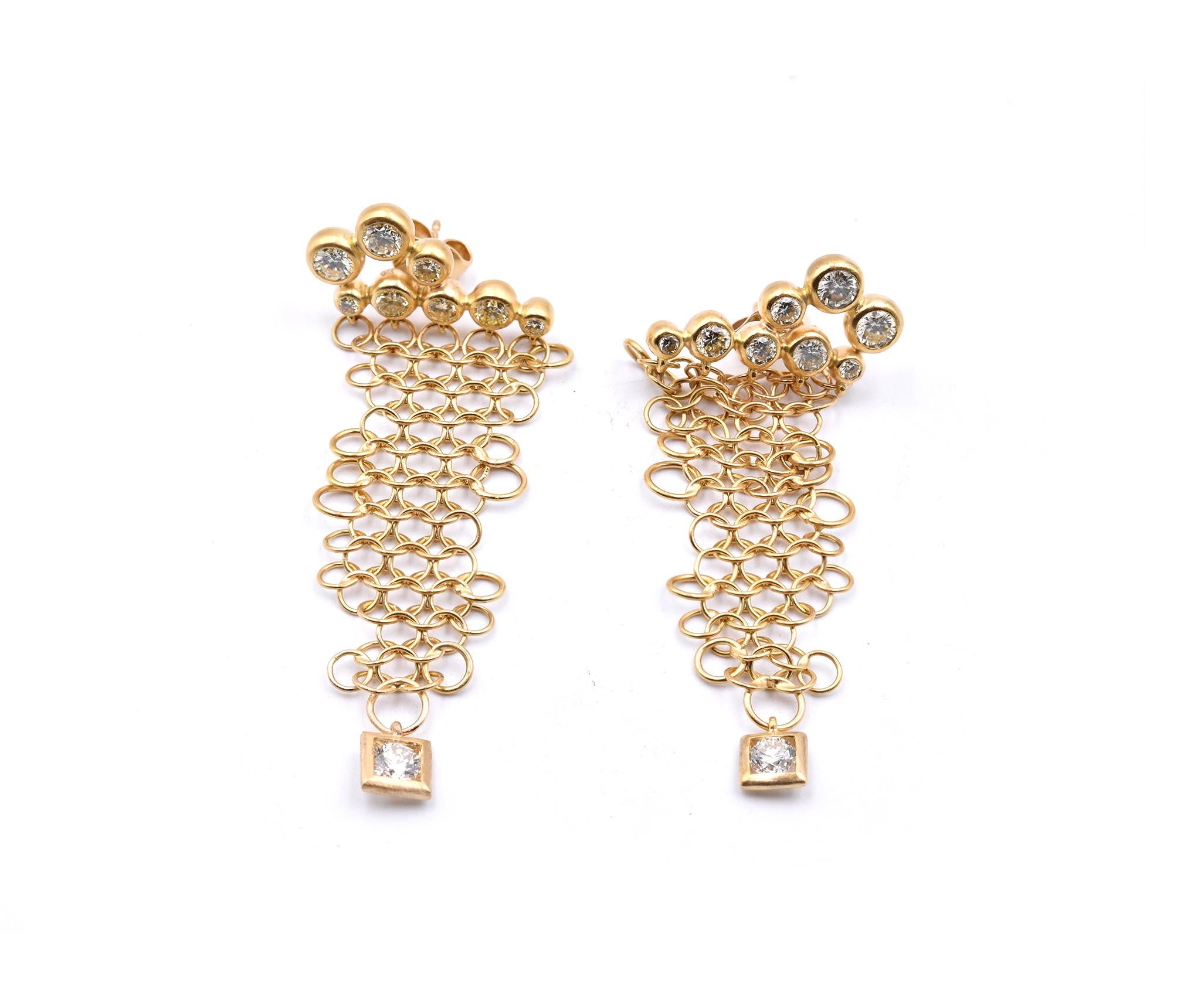 Material: 18k Yellow Gold
Diamonds: 18 round brilliant cuts = 3.25cttw
Color: J-M / G-H
Clarity: VS2
Dimensions: earrings measure 66.15mm x 24.60mm
Fastenings: post with friction back 
Weight: 17.13 grams