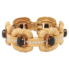 Bracelet en or jaune 18K avec diamant et onyx