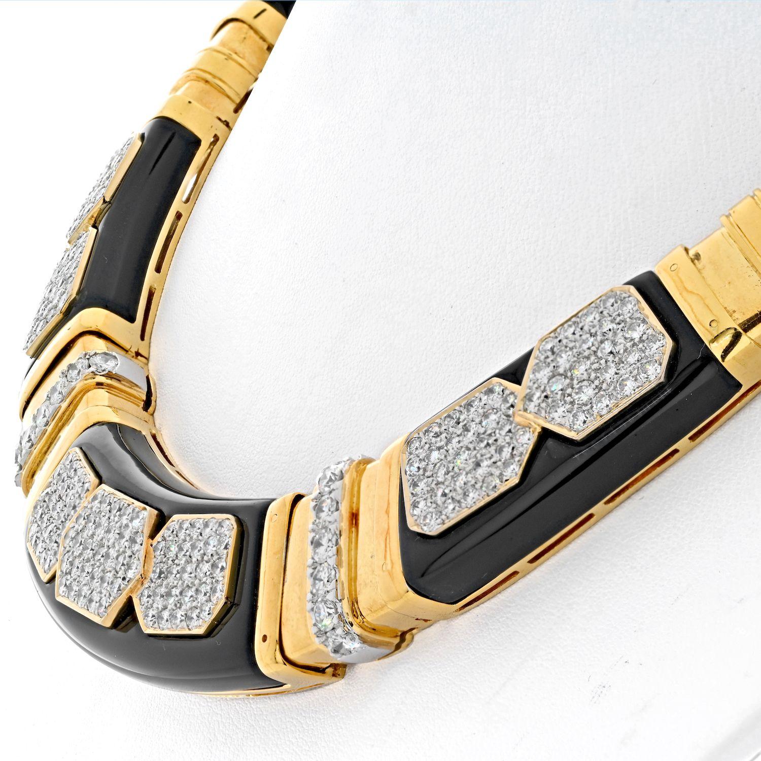 Estate 18K Yellow Gold diamond and onyx gold link collar necklace. Collar necklace is comprised of segmented diamond and gold links. Inlaid with onyx - opaque with black color and excellent polish. Featuring seven white gold pavè diamond plaques.
