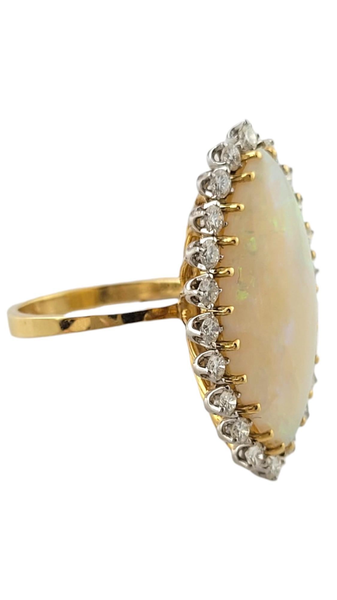 18K Yellow Gold Diamond & Opal Halo Style Ring Size 7.5

This gorgeous 18K yellow gold ring features a gorgeous marquise cabochon cut white opal with a halo of 22 sparkling, round brilliant cut diamonds!

Marquise Cut White Opal is approx. 7.0 cts,