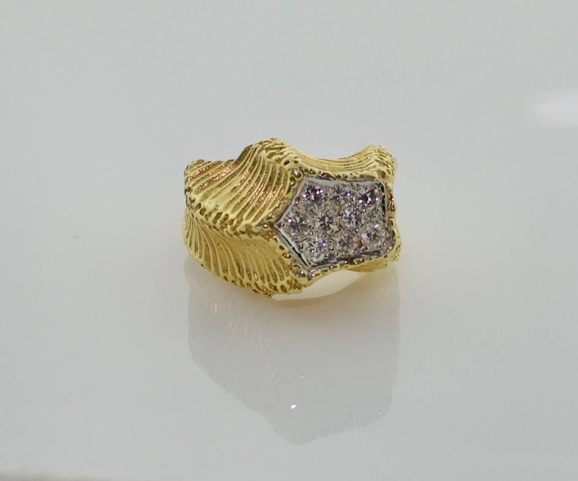 18k Yellow Gold Diamond Pave Ring
Nine Round Brilliant Cut Diamonds weighing .35 carats approximately GH VS2 SI [no visible imperfections to the naked eye]
Asymmetrical Like Life Itself   
