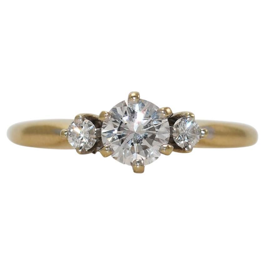 Bague en or jaune 18K avec diamant 0.55ct