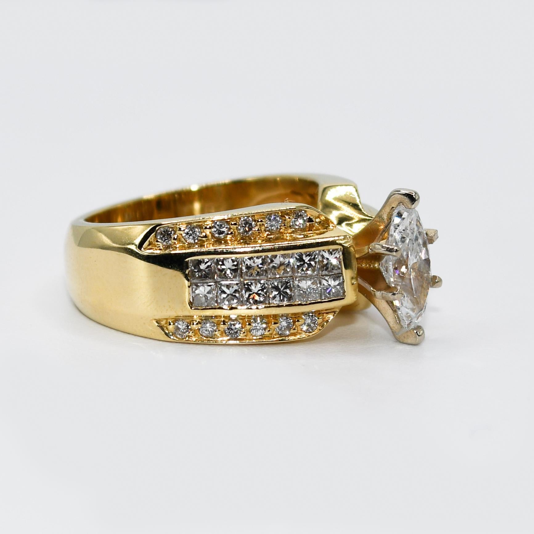 18K Yellow Gold Diamond Ring, .98ct, Marquise 1.98tdw, 11.8g

Ladies diamond engagement ring in 18k yellow gold setting. Stamped 18k and weighs 11.8 grams.
The center diamond is a marquise shape weighing .98 carats, F to G color, i1 clarity.
On the