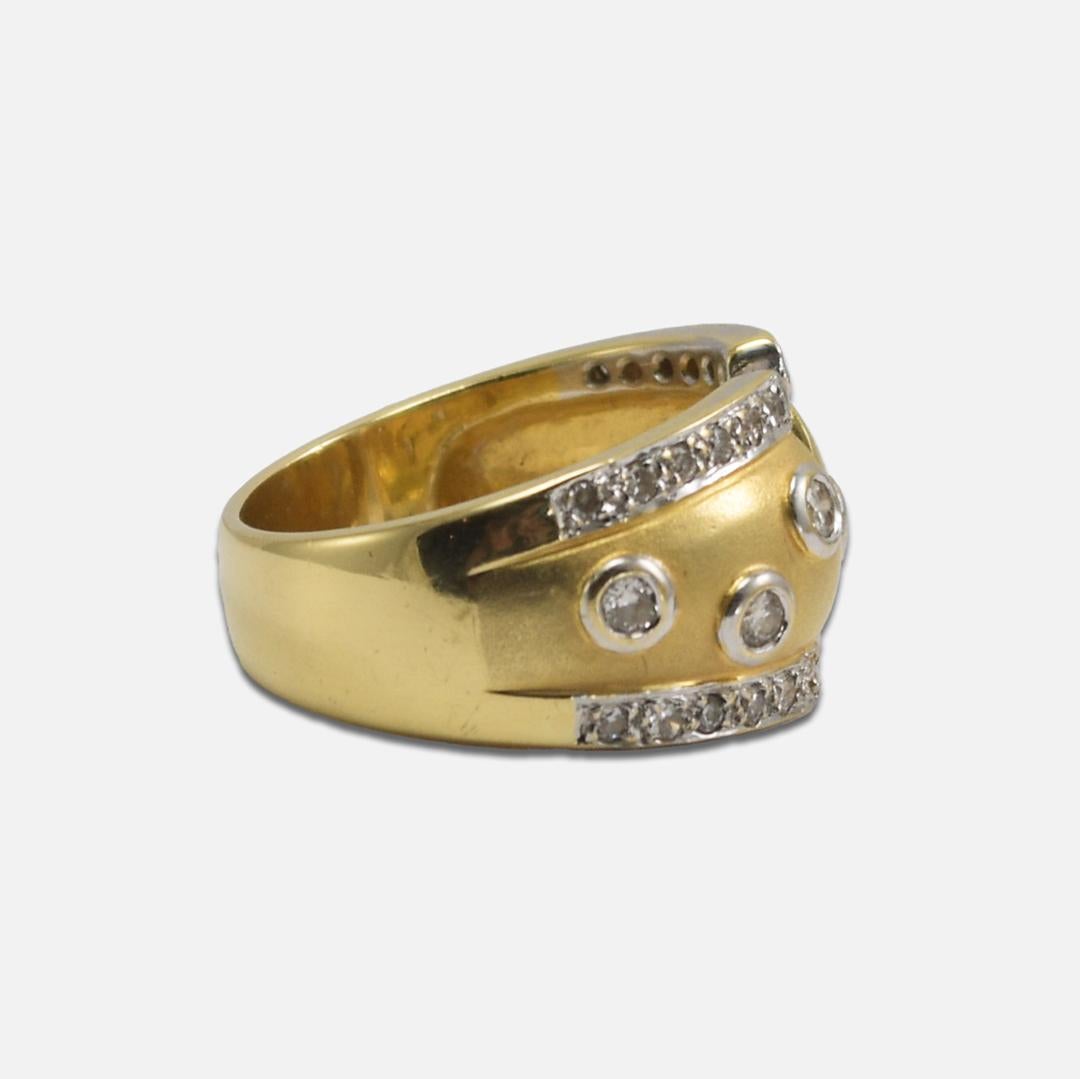 Ladies 18k yellow gold and diamond band.
Stamped 18k and weighs 8.8 grams.
The round diamonds are i to j color, si clarity, .35 total carats.
The ring measures 11.5mm wide at the top.
The ring size is 6. 
Excellent condition.