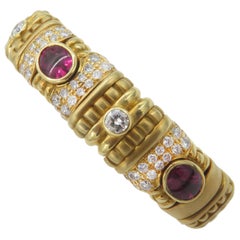 Pulsera de oro amarillo de 18 quilates con diamantes y rubelita
