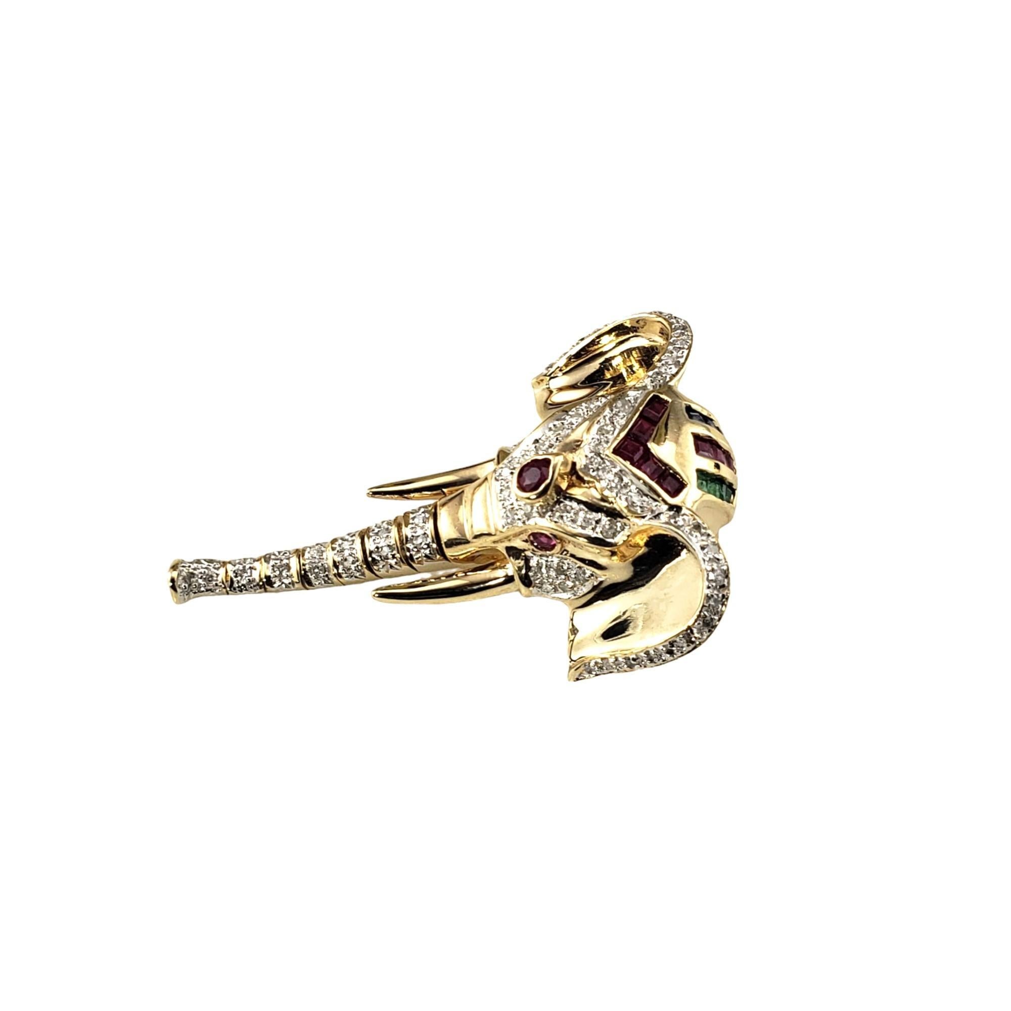 Vintage 18K Yellow Gold Diamond, Ruby, Sapphire and Elephant Pendant-

This stunning pendant features 63 round single cut diamonds, eight square rubies, three round rubies, three square sapphires and three square emeralds set in beautifully detailed