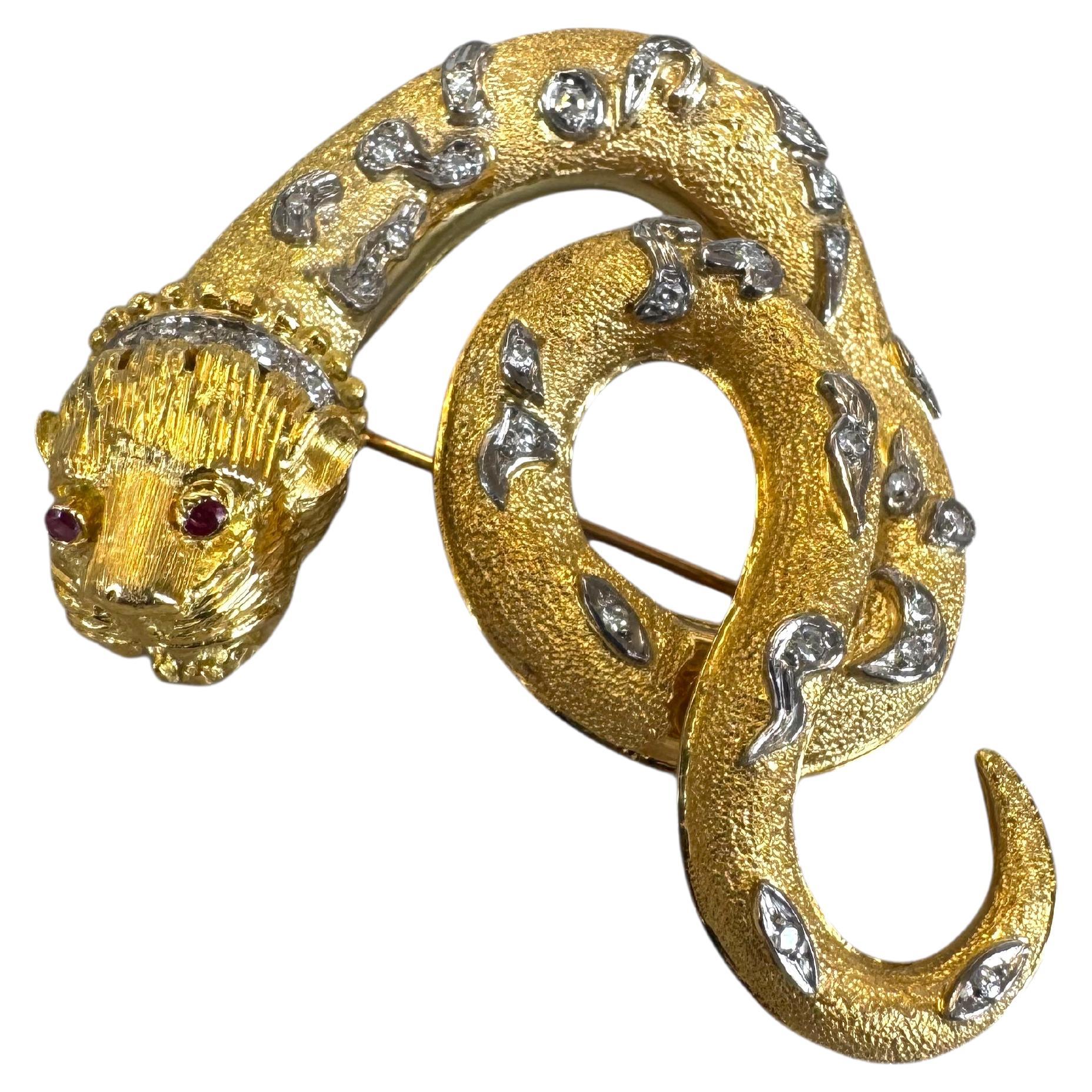 Broche serpent en or jaune 18K avec diamants et rubis