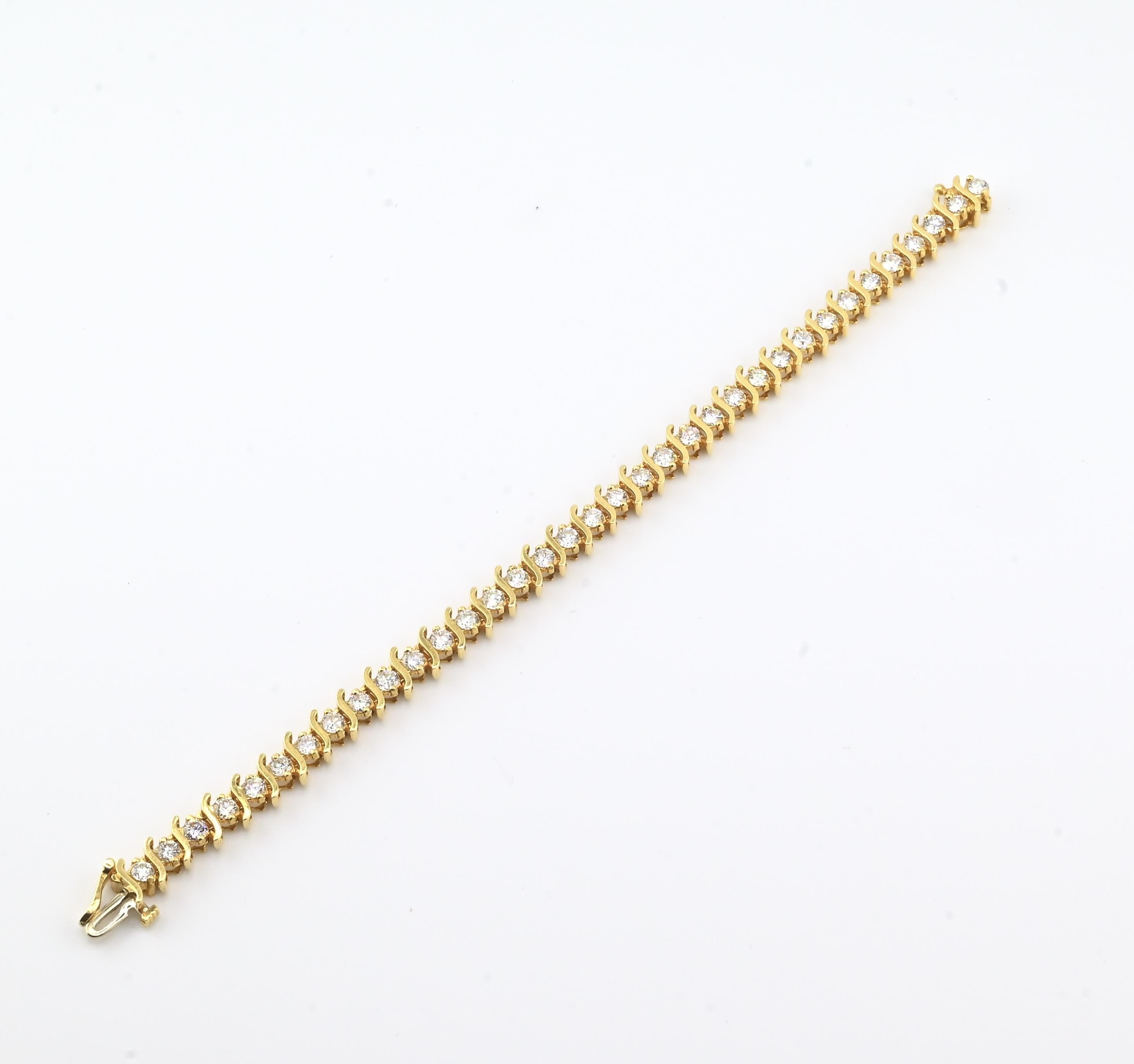 Bracelet de tennis en or jaune 18K avec diamants • 23.31g • 35 diamants naturels en vente 1