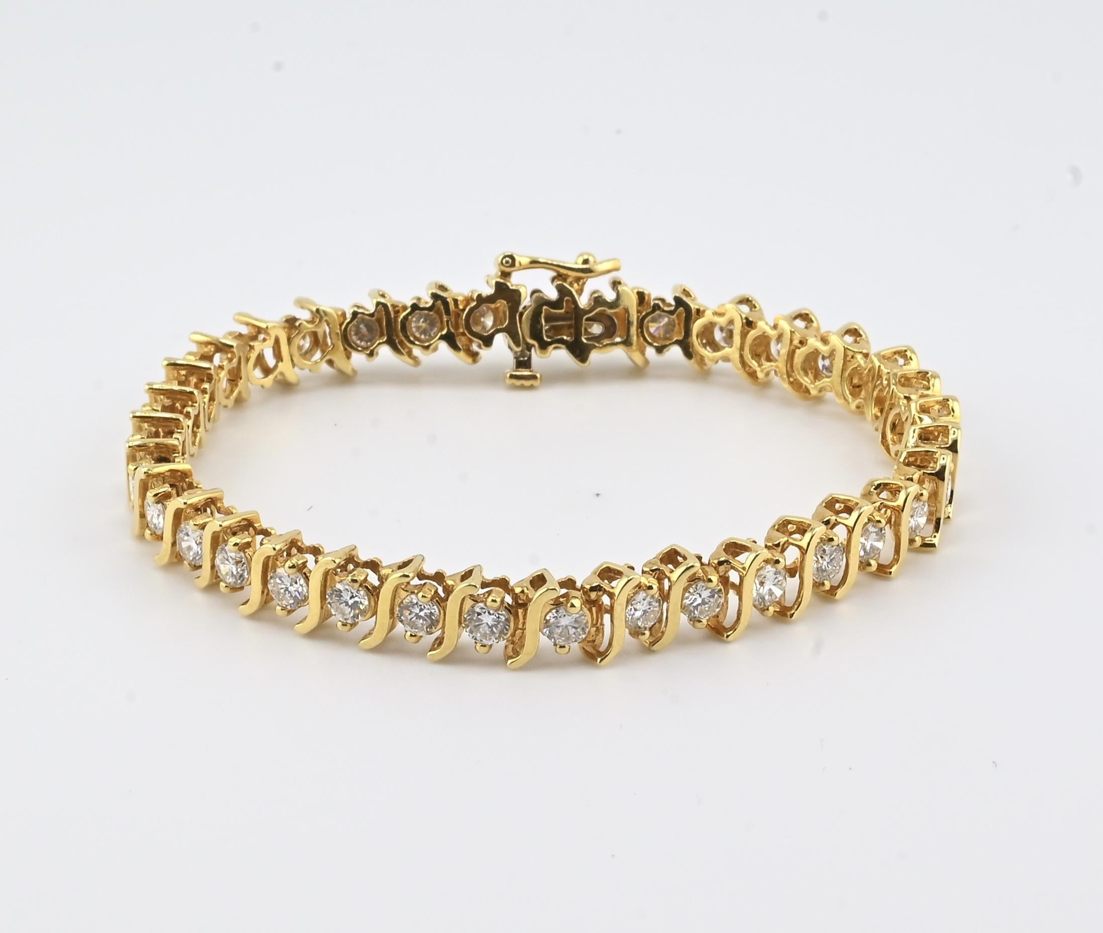 Bracelet de tennis en or jaune 18K avec diamants • 23.31g • 35 diamants naturels en vente 2