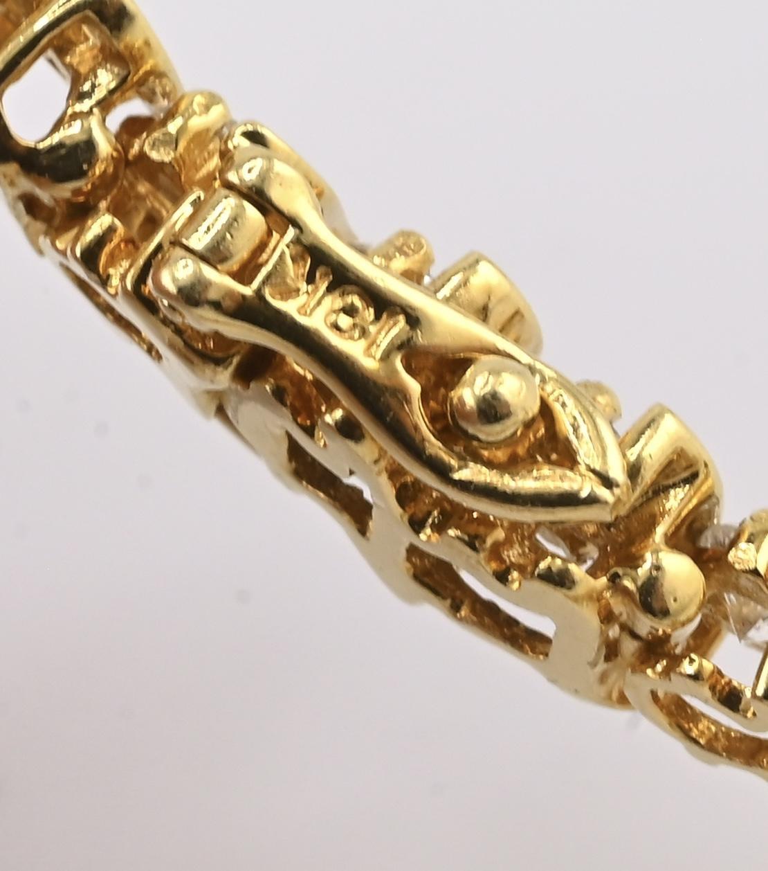 Bracelet de tennis en or jaune 18K avec diamants • 23.31g • 35 diamants naturels en vente 4