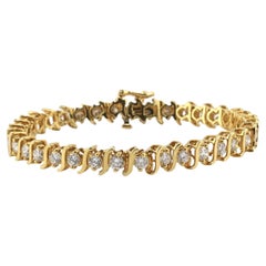 Bracelet de tennis en or jaune 18K avec diamants • 23.31g • 35 diamants naturels