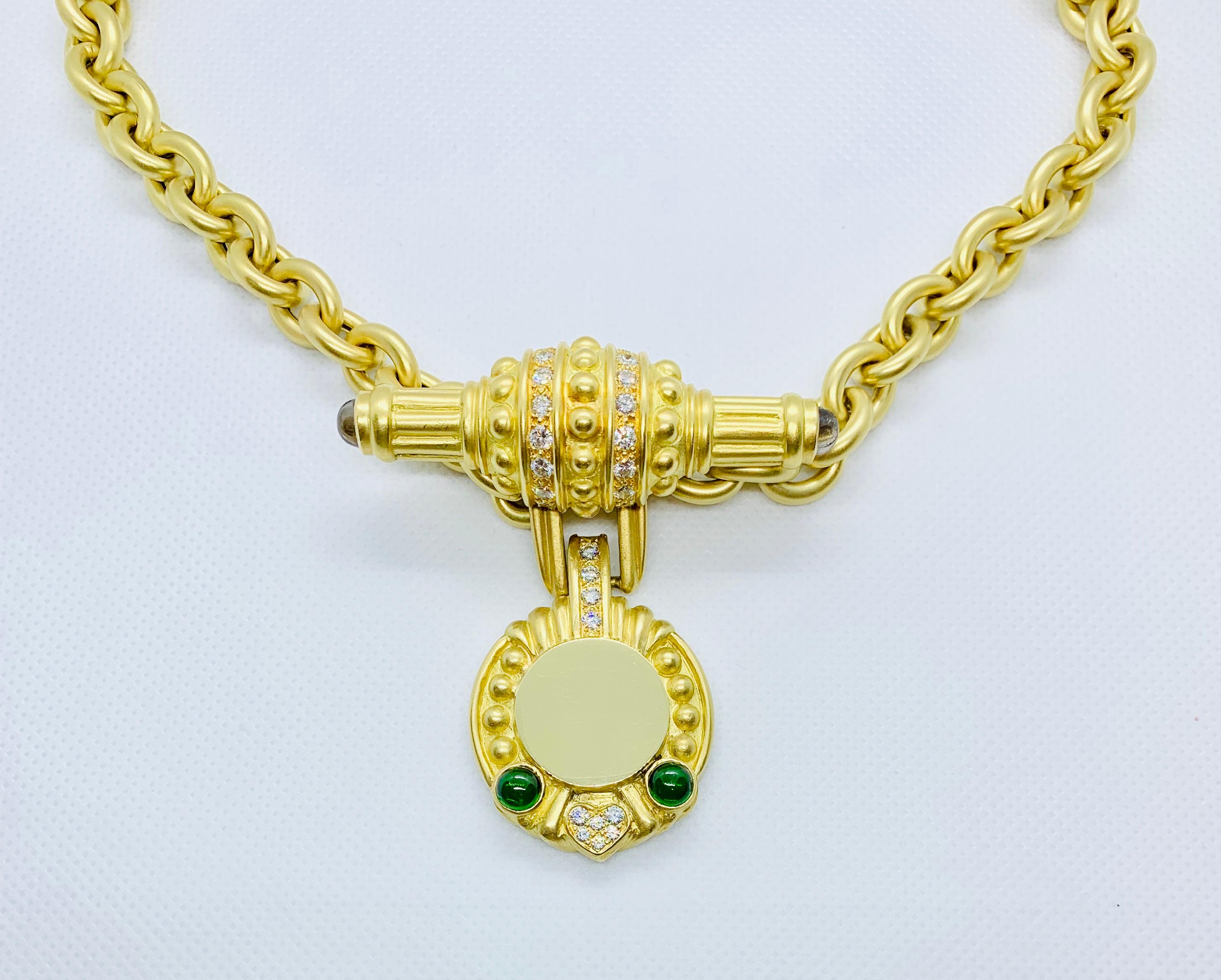 This set is absolutely stunning! The enhancer is in 18K Yellow Gold and features 22 brilliant diamonds (estimated carat weight is 1.88). There is a diamond heart at the center of the bottom that is flanked by two gorgeous Cabochon Green Tourmalines.