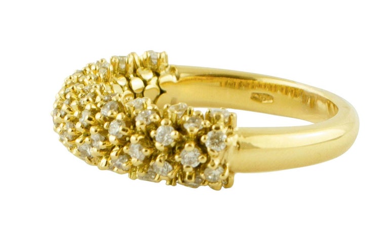 SHIPPING POLICY:
No additional costs will be added to this order.
Shipping costs will be totally covered by the seller (customs duties included).

Band ring in 18k yellow gold structure, mounted with 1.29ct of high quality diamonds.
The origin of