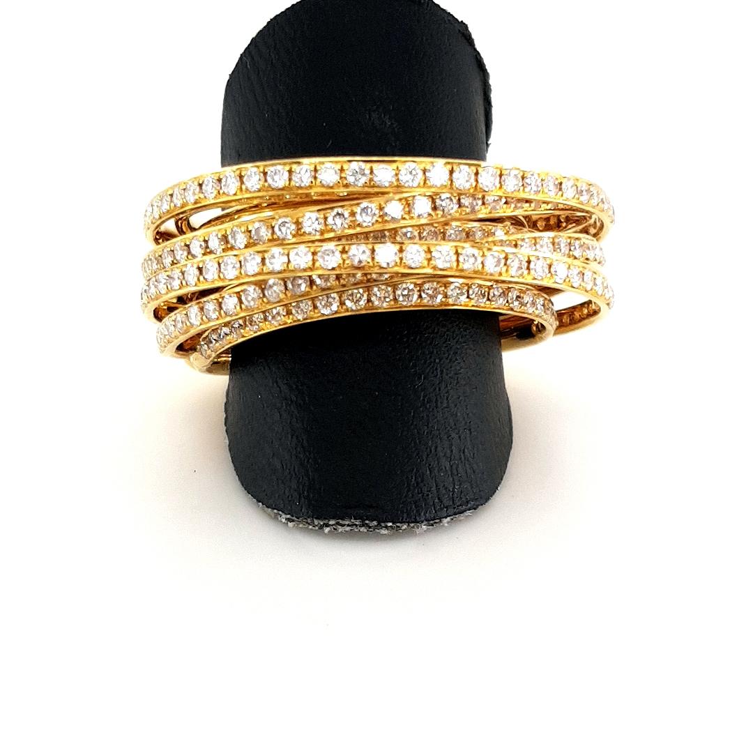 Yellow Gold, White Diamonds, de GRISOGONO Allegra Ring

Impressive DE GRISOGONO ring in yellow gold set with diamonds, this piece looks like numerous bands stacked together in an eternal spiral representing the unbreakable bond of love. 

It's