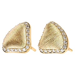 Clous d'oreilles en forme de galets en or jaune 18 carats et diamants