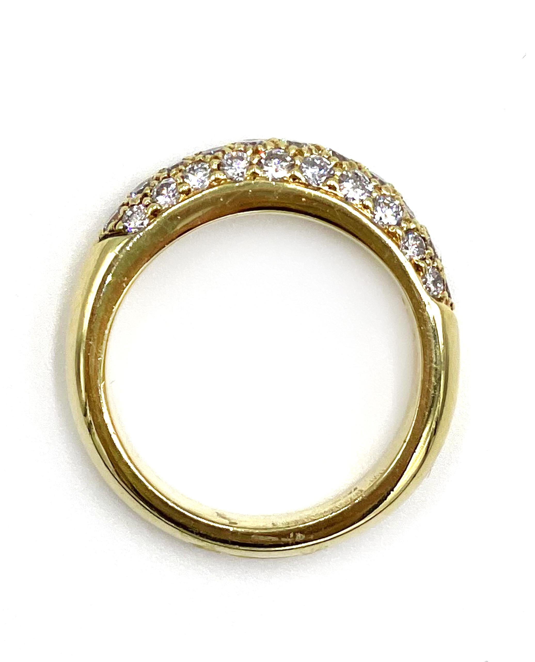 18K yellow gold dome ring with 31 round pave set diamonds totaling 1.15 carats. G color, VS clarity.

-Finger size: 7.25
-5mm wide