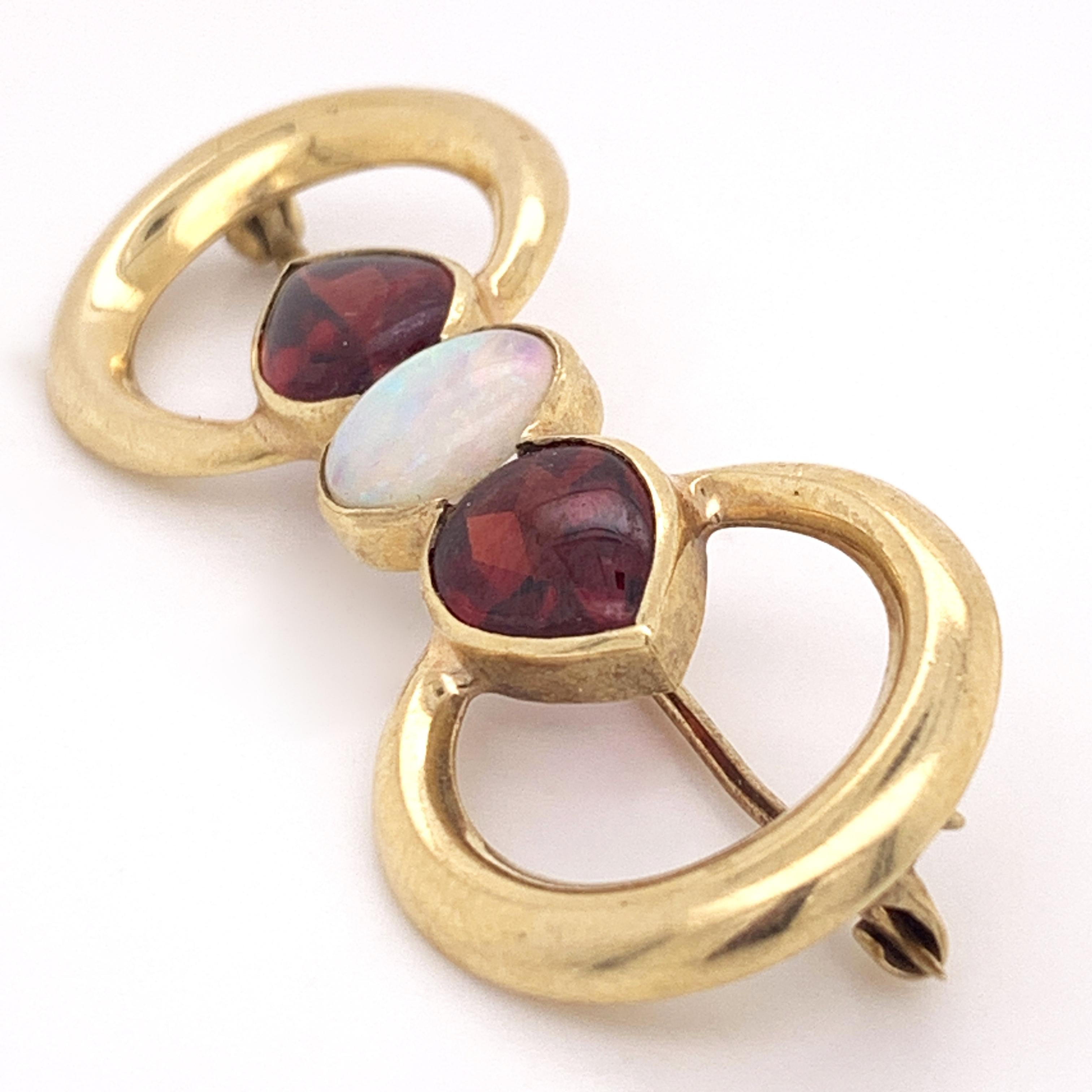 Artisan 18 Karat Yellow Gold Double Ring Brooch with Opal and Garnet Stones