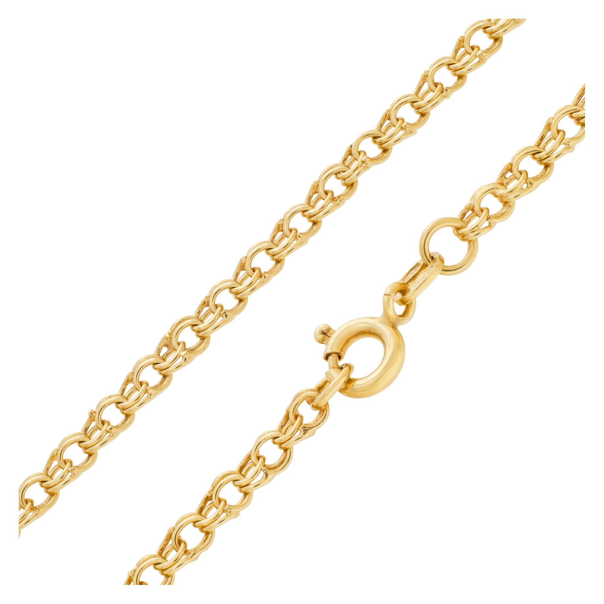 18k yellow gold double ring chain. Length 35.5 inches. Width 3.1mm
