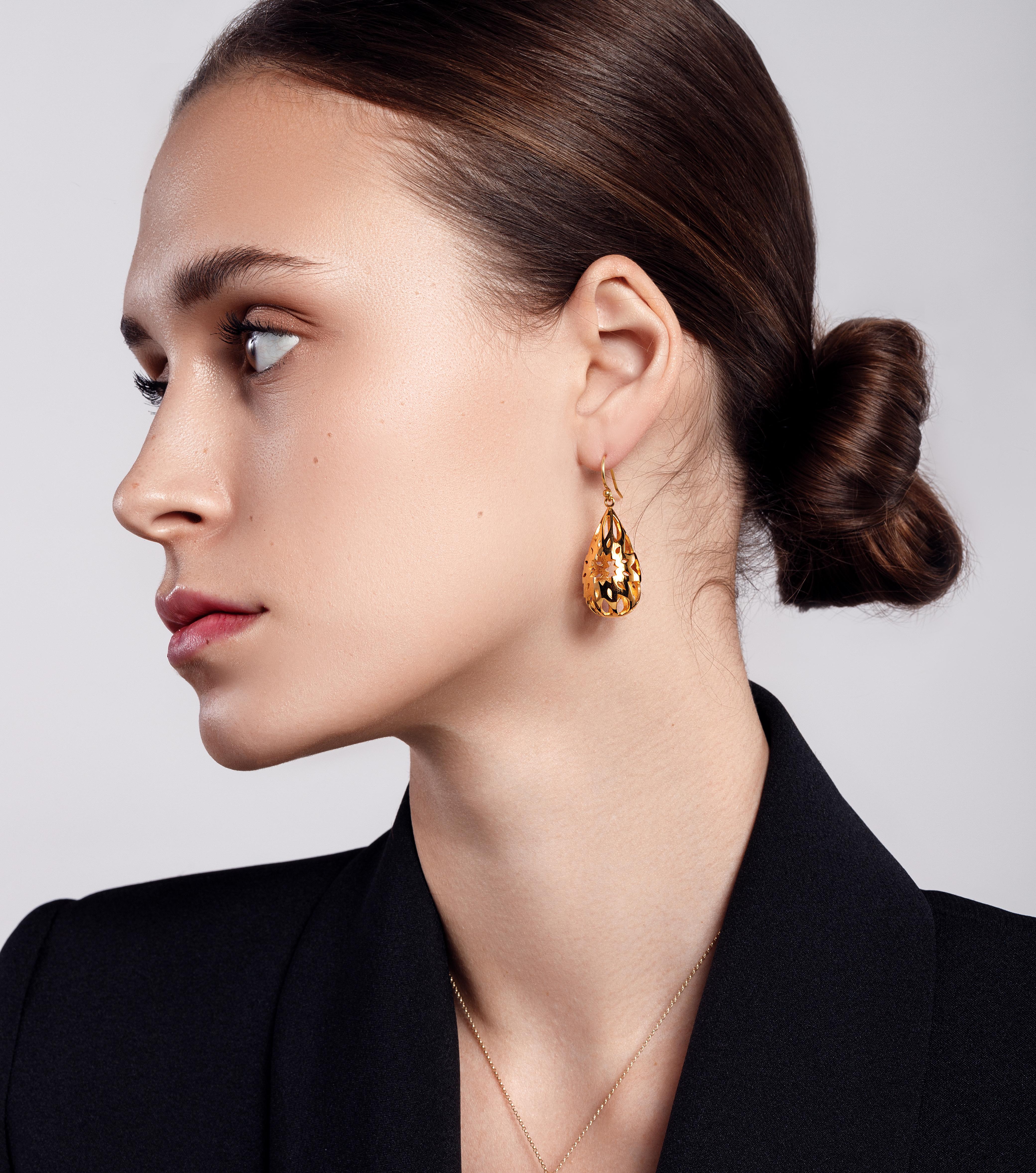 Moshabak drop earrings in 18K solid yellow gold were designed by Sanaz Doost, Designer and founder of Sanaz Doost jewelry; inspired by ancient middle eastern art & architecture. These modern, timeless and sensual earrings are lightweight & very