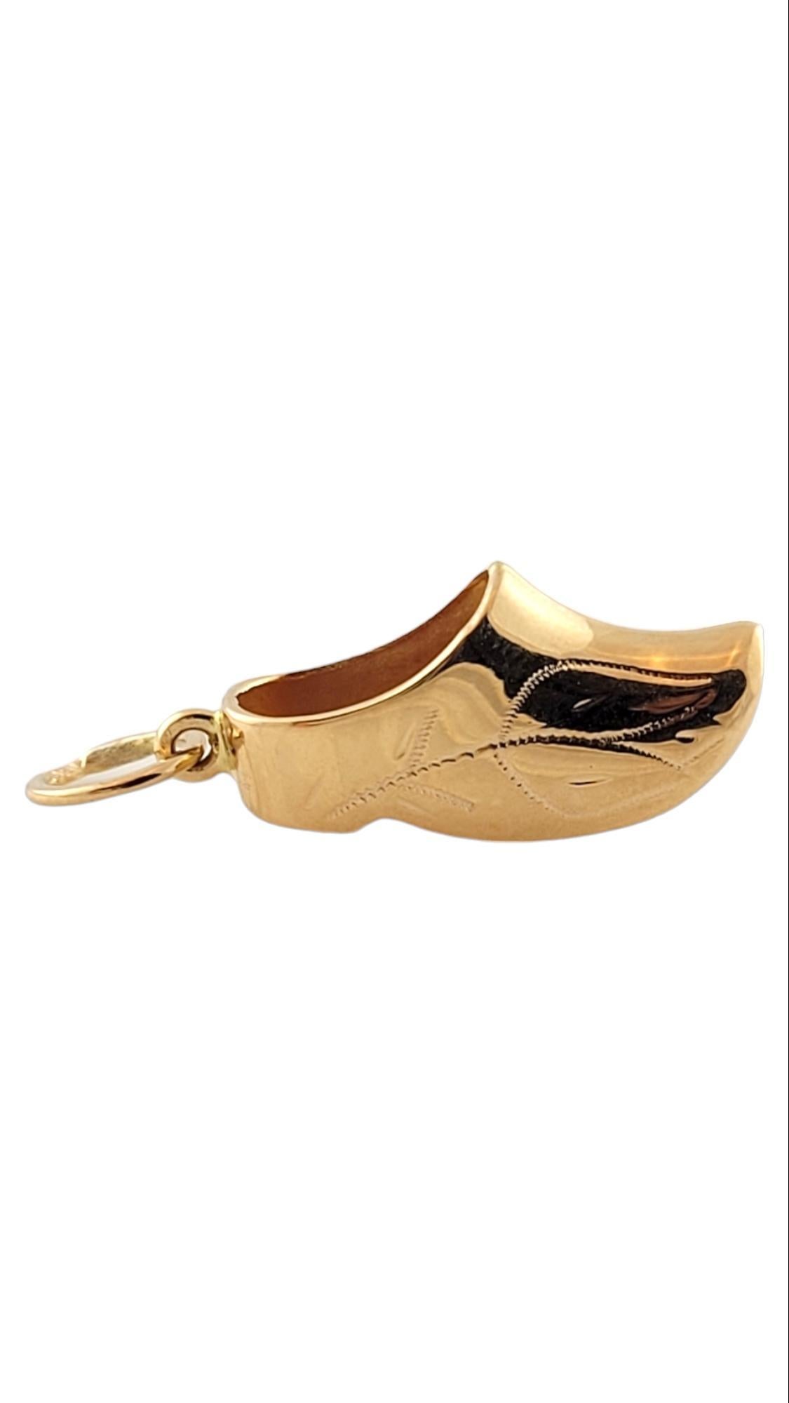 Beautiful Dutch shoe charm is made in 18k yellow gold and features small details of a tulip on both sides of the shoe.

Size: 23mm X 10mm

Weight: 1.6 gr / 1.0 dwt

Hallmark: 18K

Very good condition, professionally polished.

Will come packaged in
