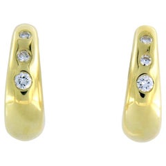 18k yellow gold ear clips set with brilliant cut diamonds. 0.50ct