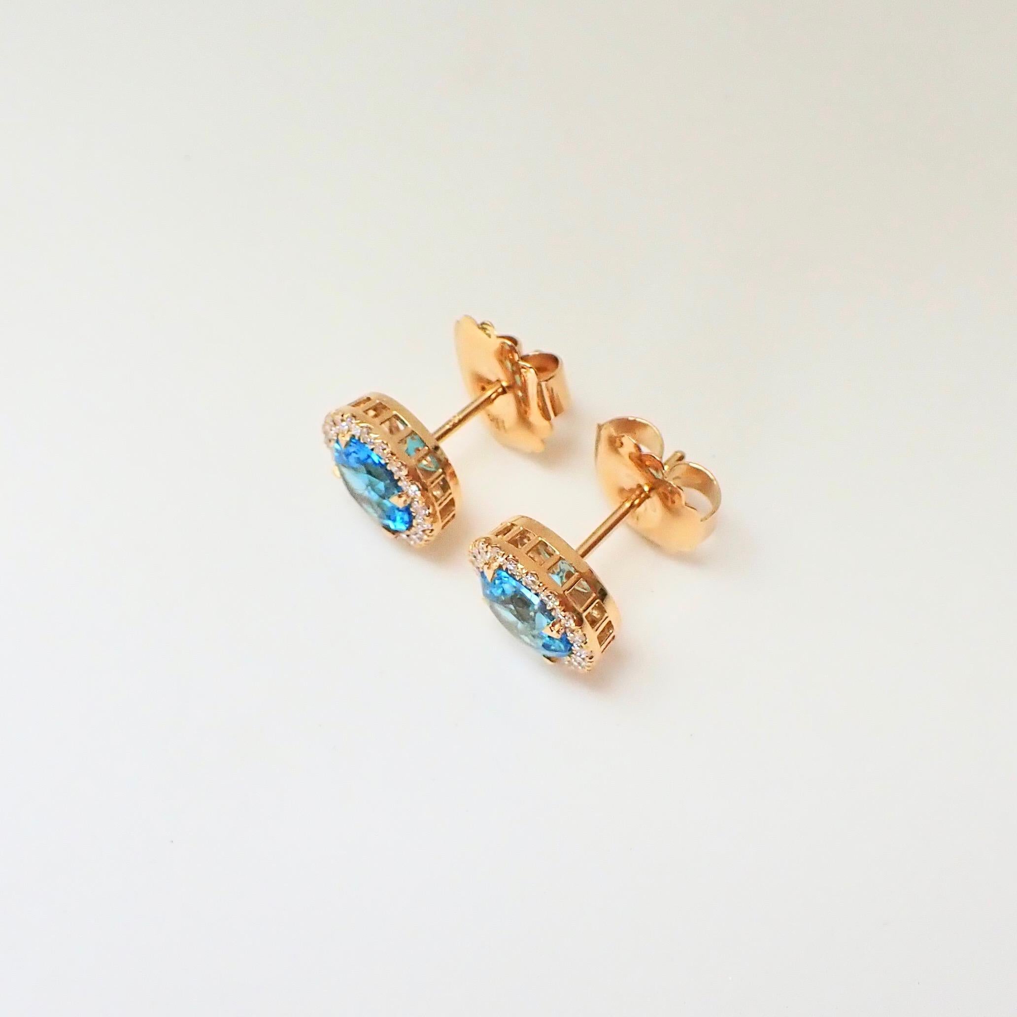 Round Cut 18k Yellow Gold Earrings with Blue Topaz and 0.42 Carats of Diamond For Sale
