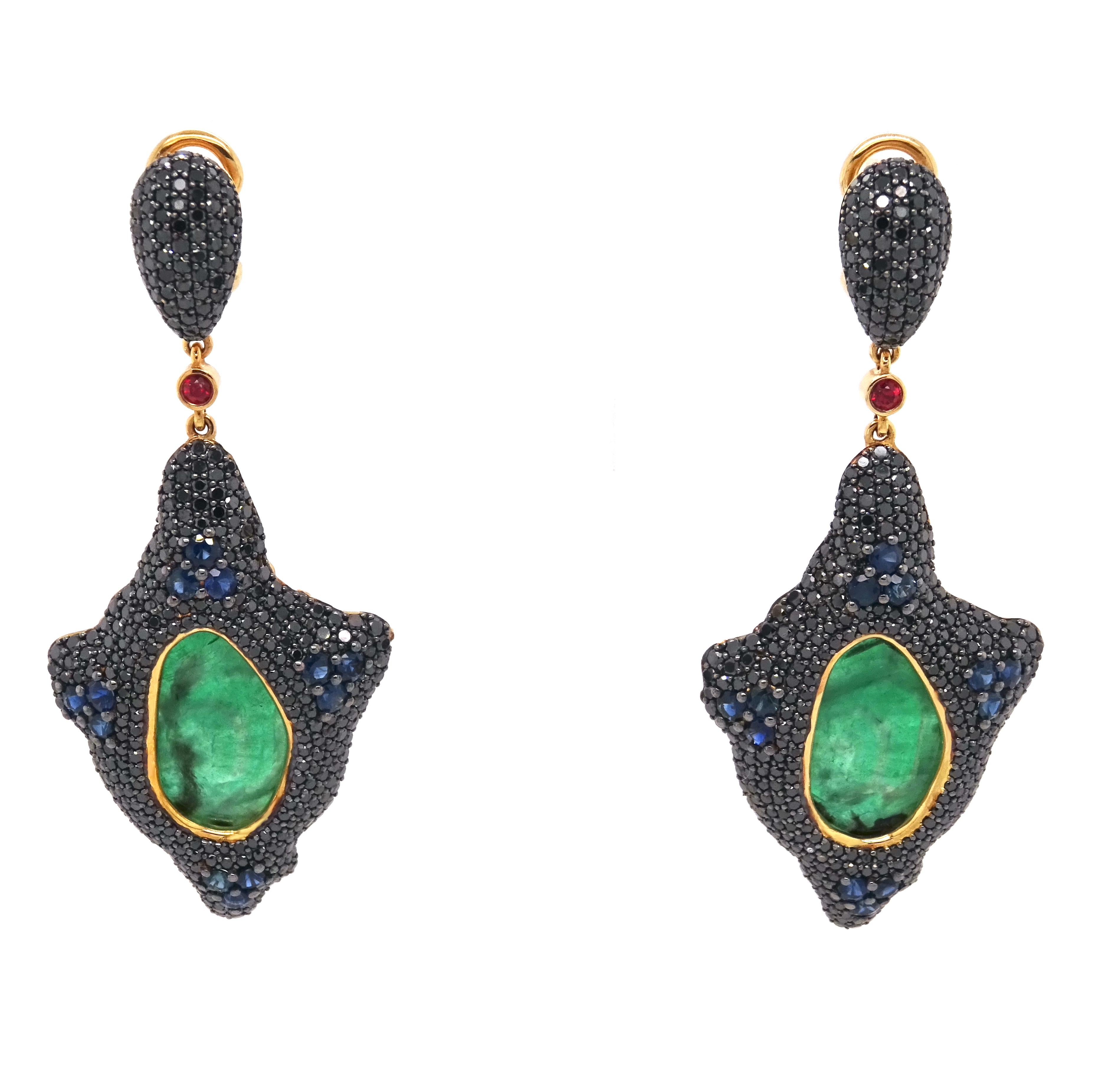 Pure Venom Collection by VOTIVE.

Step into the alluring world of VOTIVE's Pure Venom Collection, where elegance meets danger in these majestic Stingray Earrings. At the heart of these captivating earrings lie two vivid emeralds, exuding a vibrant
