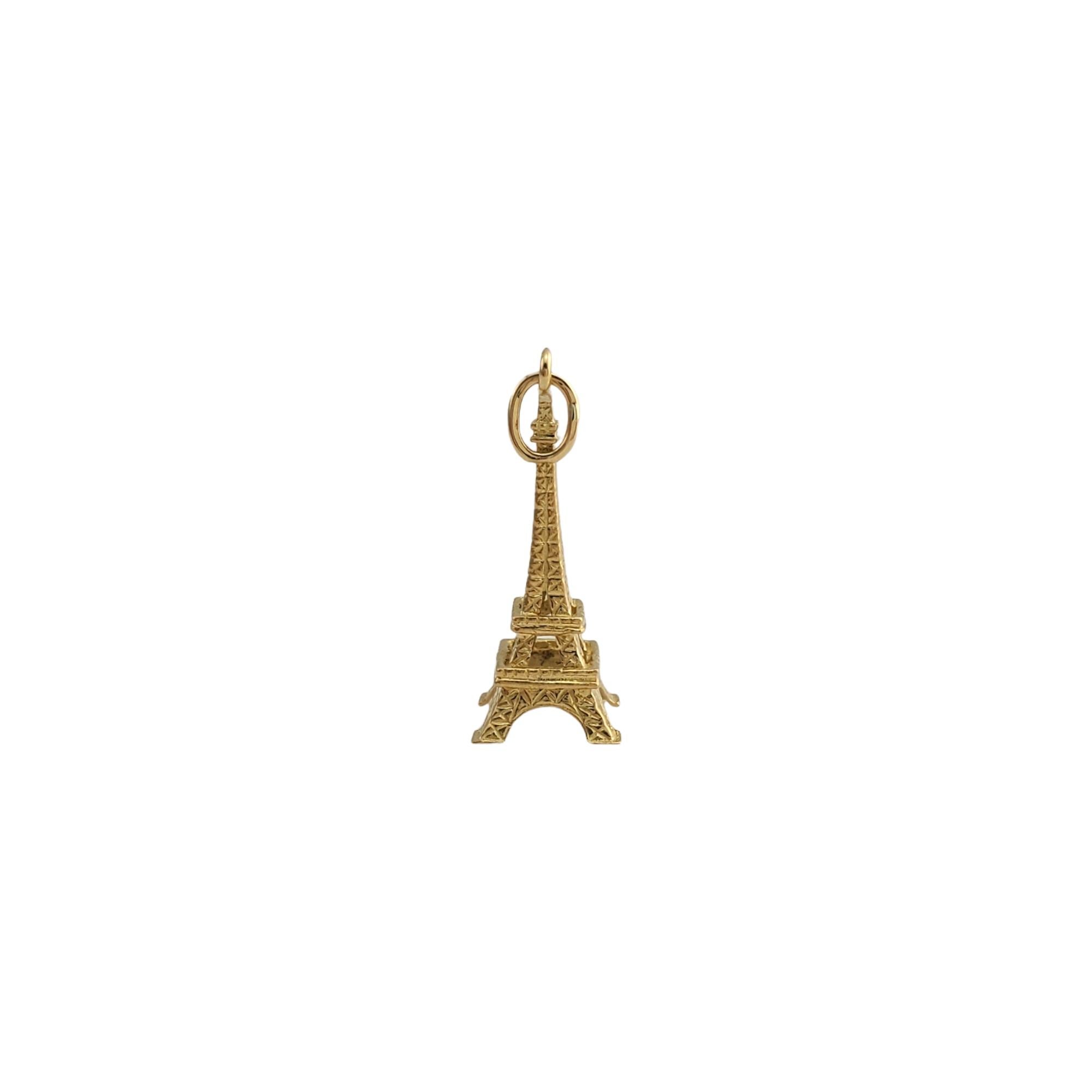 Vintage 18K Yellow Gold Eiffel Tower Charm 

Eiffel for this adorable 18k yellow gold charm! 

Size: 7.56 mm X 24.51mm

Weight:  1.6 gr / 1.0 dwt

Very good condition, professionally polished.

Will come packaged in a gift box and will be shipped