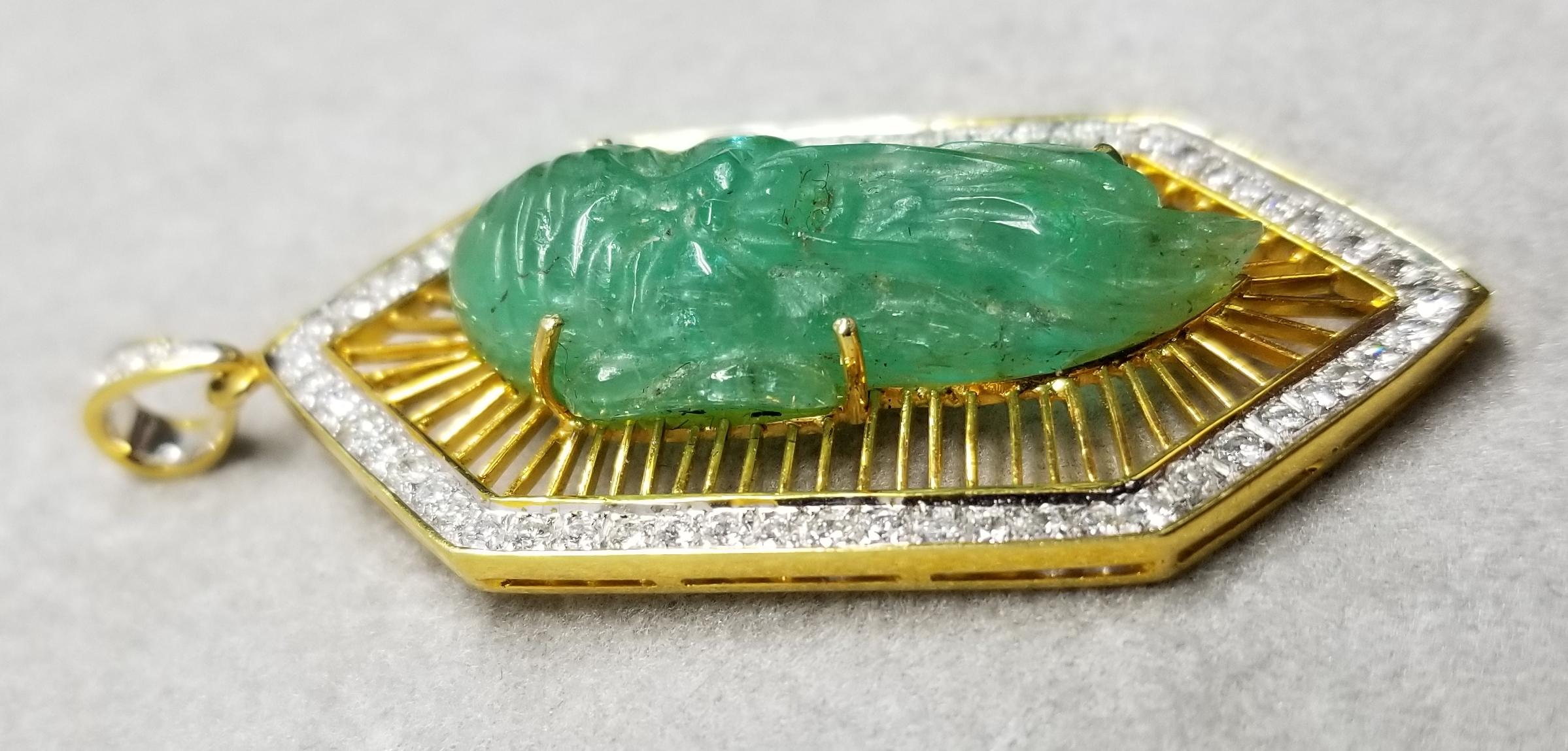 Contemporary 18 Karat Gold Emerald and Diamond Pendant Containing 1 Hand Carved Emerald For Sale