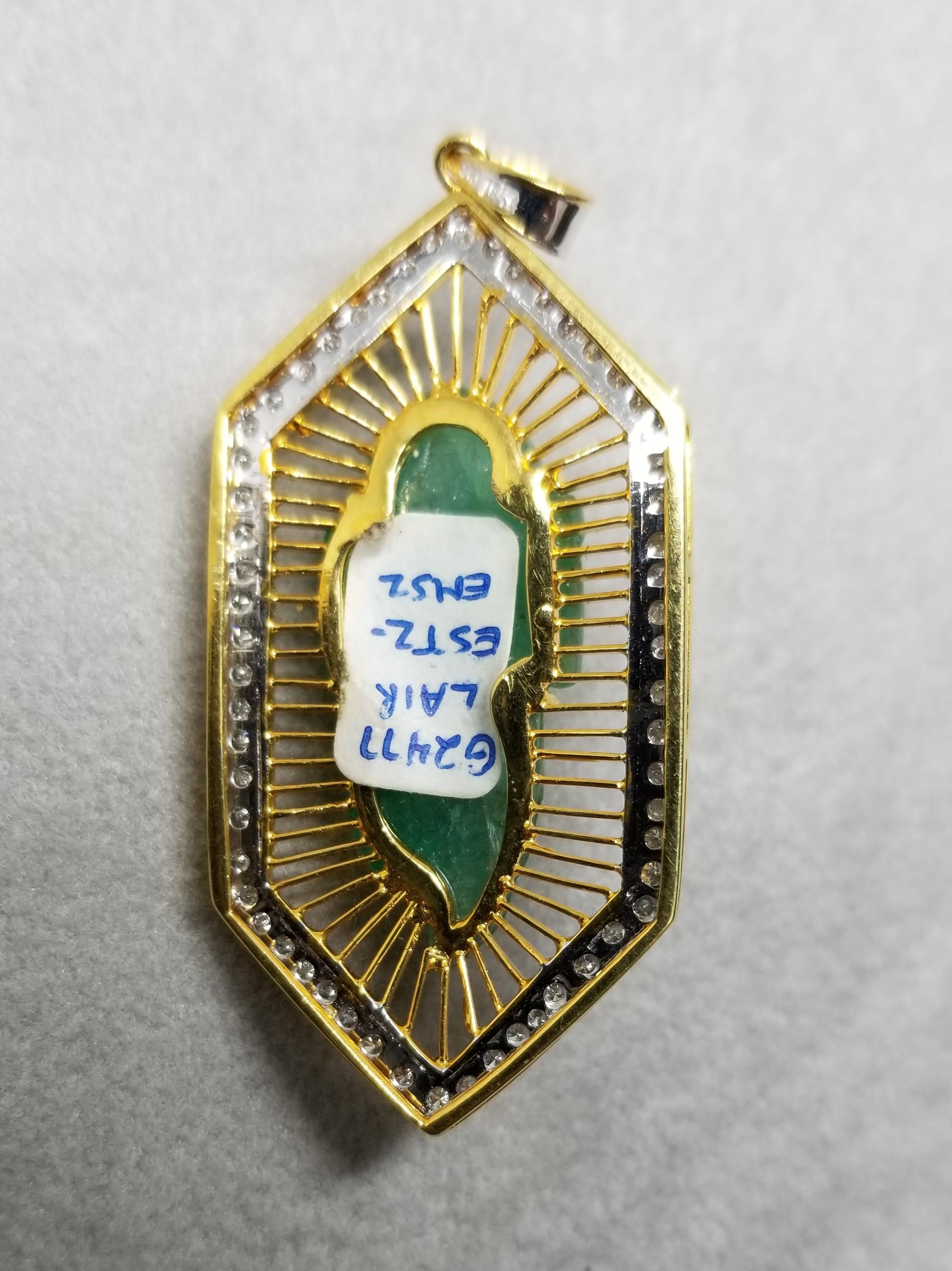 Round Cut 18 Karat Gold Emerald and Diamond Pendant Containing 1 Hand Carved Emerald For Sale