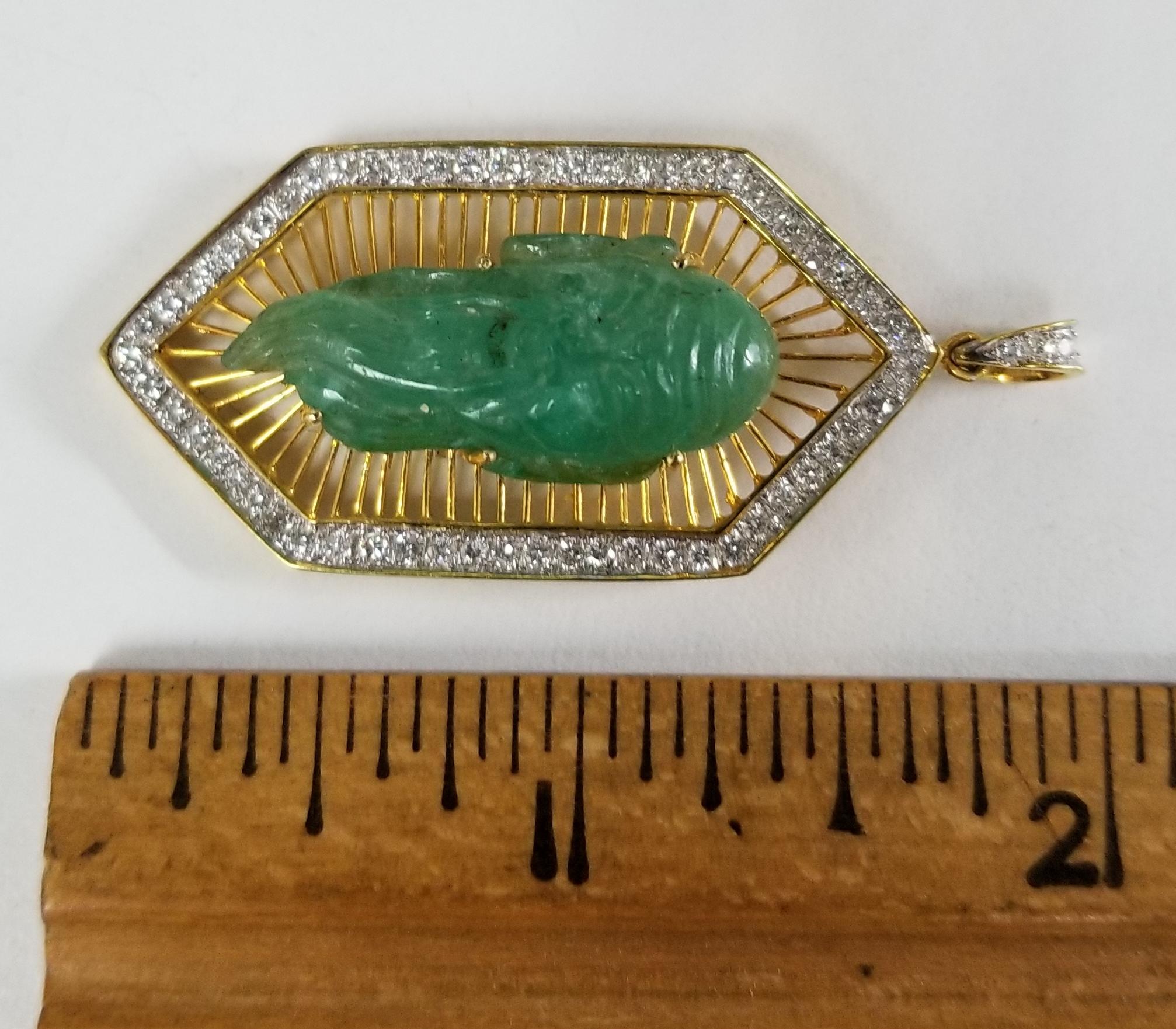18 Karat Gold Emerald and Diamond Pendant Containing 1 Hand Carved Emerald In New Condition For Sale In Los Angeles, CA