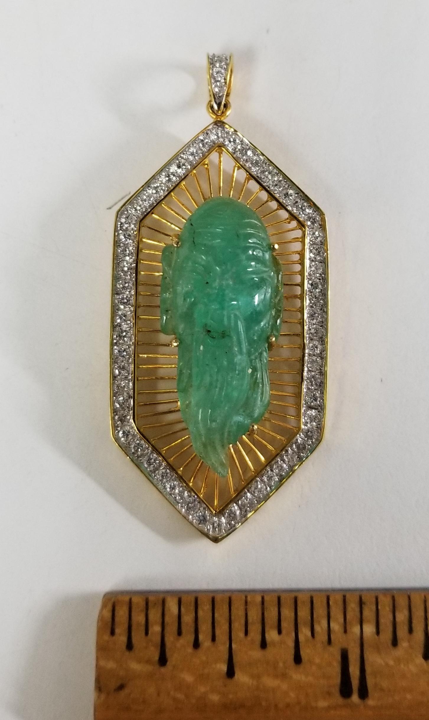 Women's or Men's 18 Karat Gold Emerald and Diamond Pendant Containing 1 Hand Carved Emerald For Sale