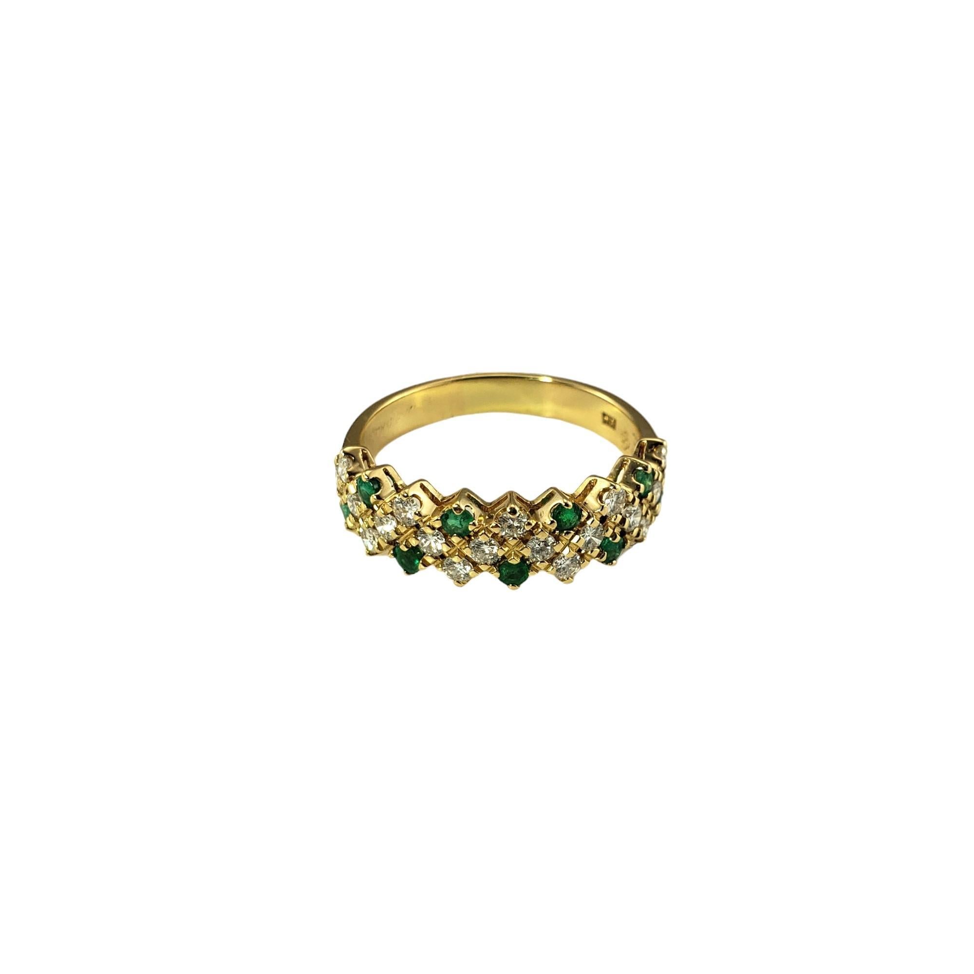 18K Yellow Gold Emerald and Diamond Ring Size 8.75 JAGi Certified-

This lovely ring features nineteen round brilliant cut diamonds and eight round cut natural emeralds set in classic 18K yellow gold.  Width:  6 mm.  Shank: 3 mm.

Total emerald