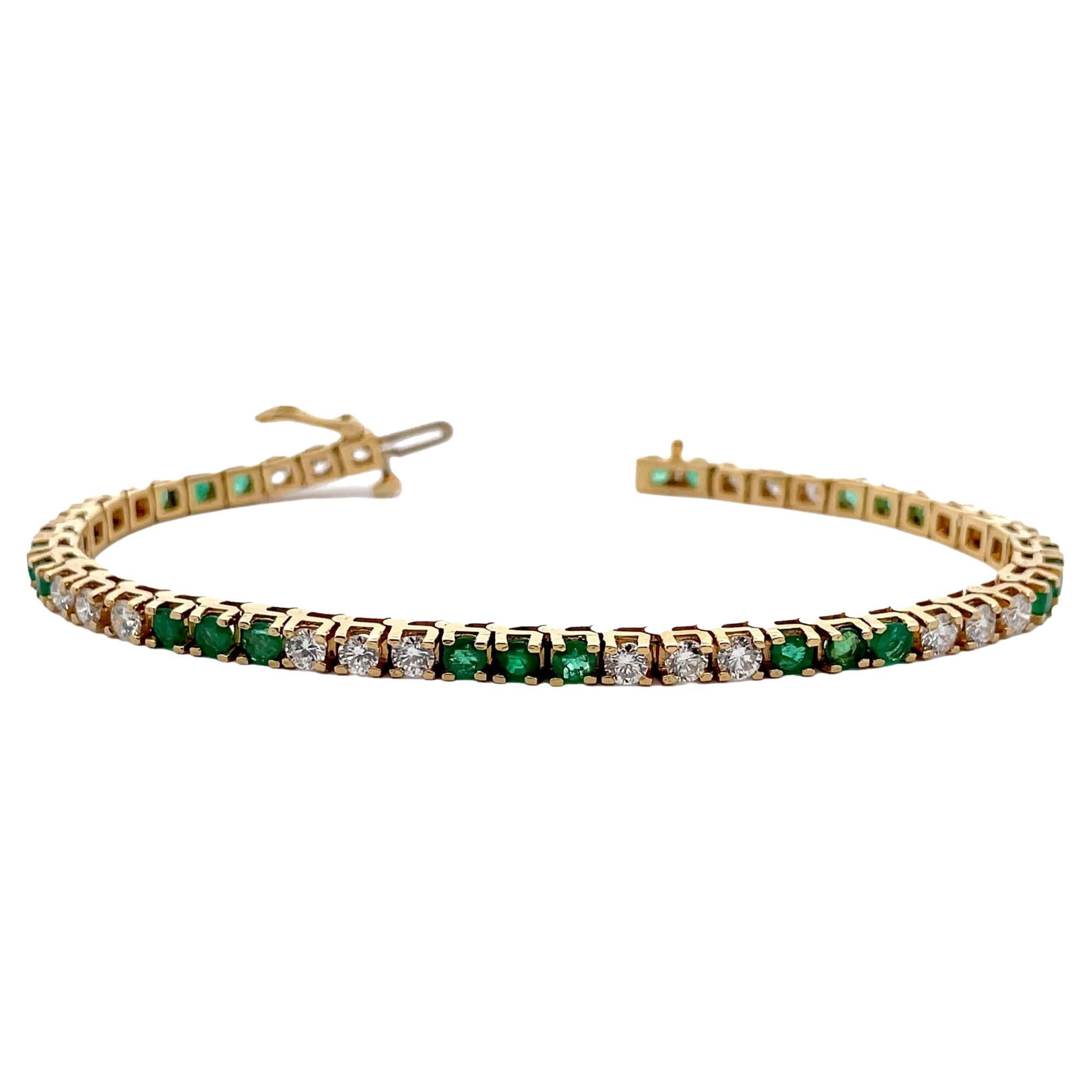 Tennisarmband aus 18 Karat Gelbgold mit Smaragd und Diamant
