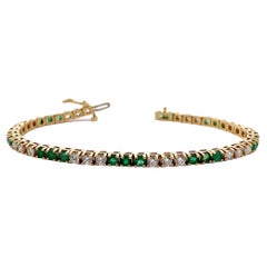 18K Yellow Gold Emerald and Diamond Tennis Bracelet