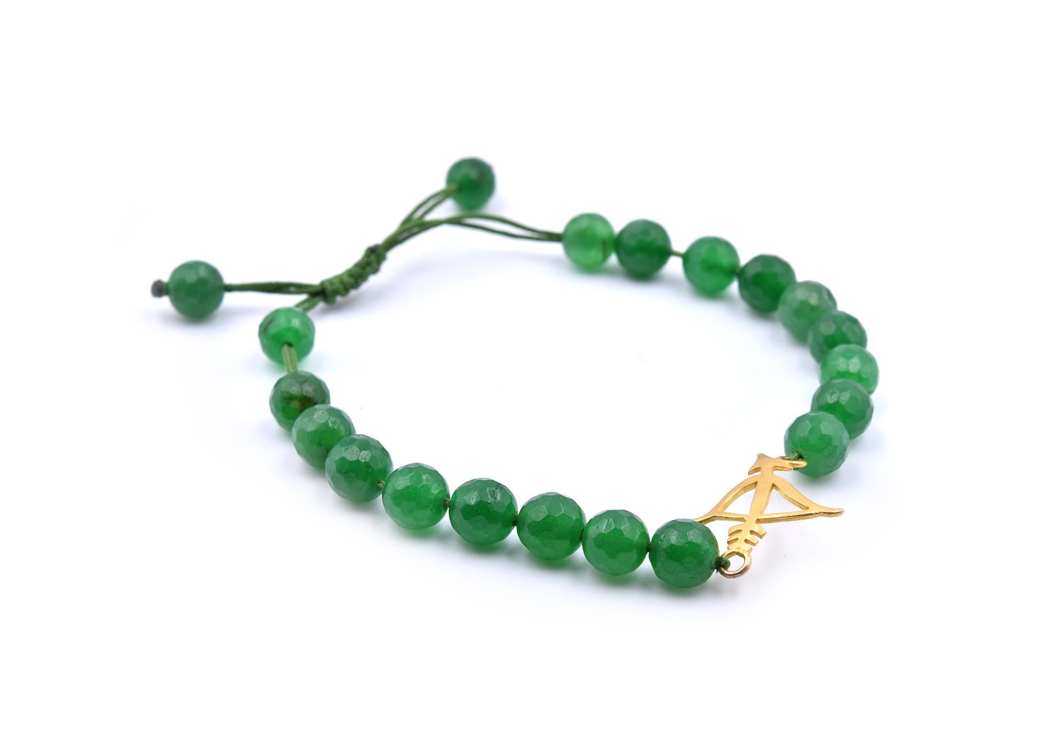 Designer: custom design
Material: 18k yellow gold 
Emerald: emerald faceted beads 
Dimensions: bracelet will fit a 7-inch wrist, it is 7.87mm wide
Weight: 14.3 grams