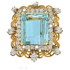 Vintage 18K Yellow Gold Emerald Cut Aquamarine And Diamond Halo Ring